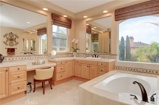 a living room with fireplace furniture and a window