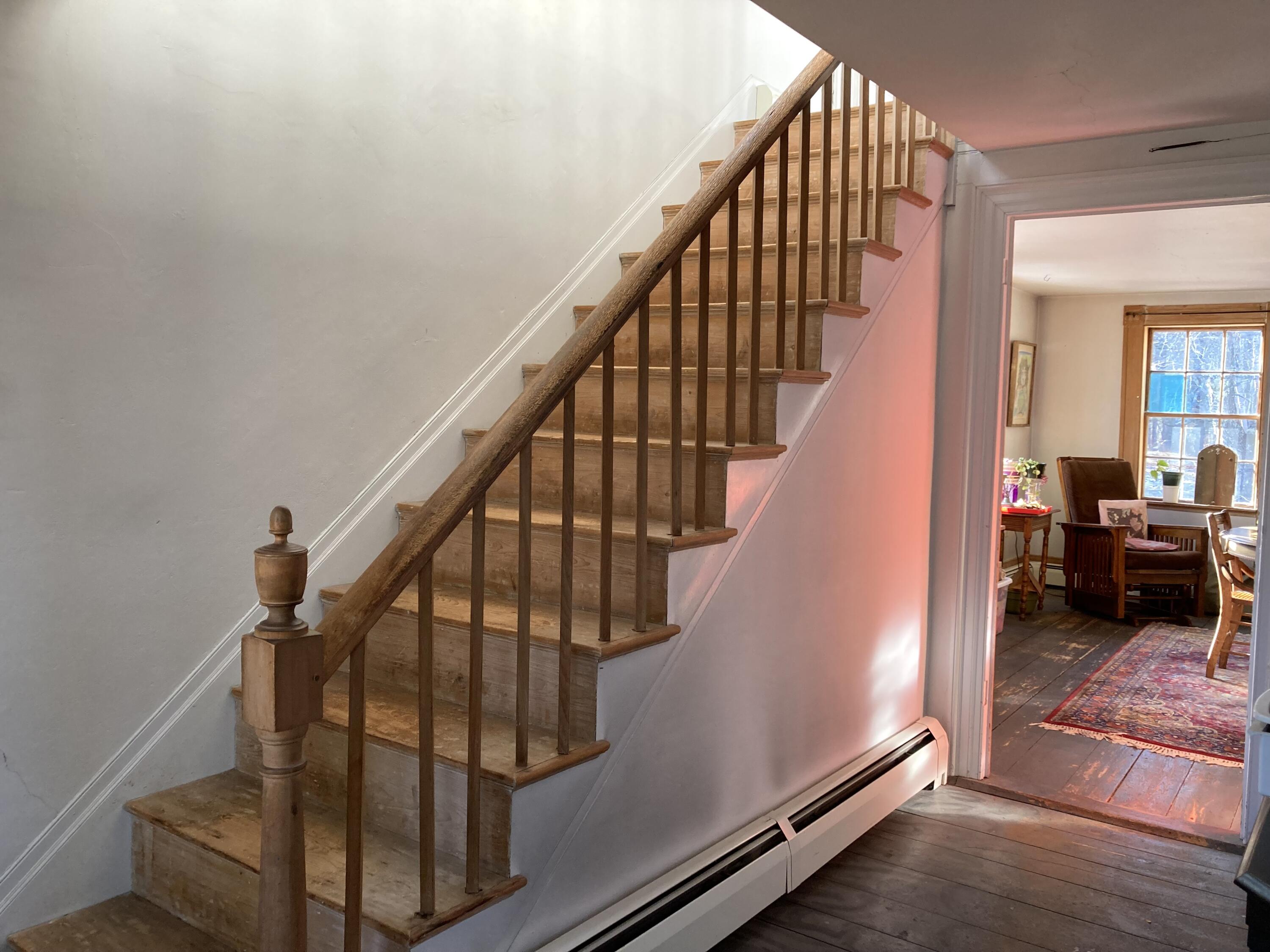 3 Rogers Point Road Steuben, ME 04680 - Photo 14 of 31 Stairway to second floor from entry.