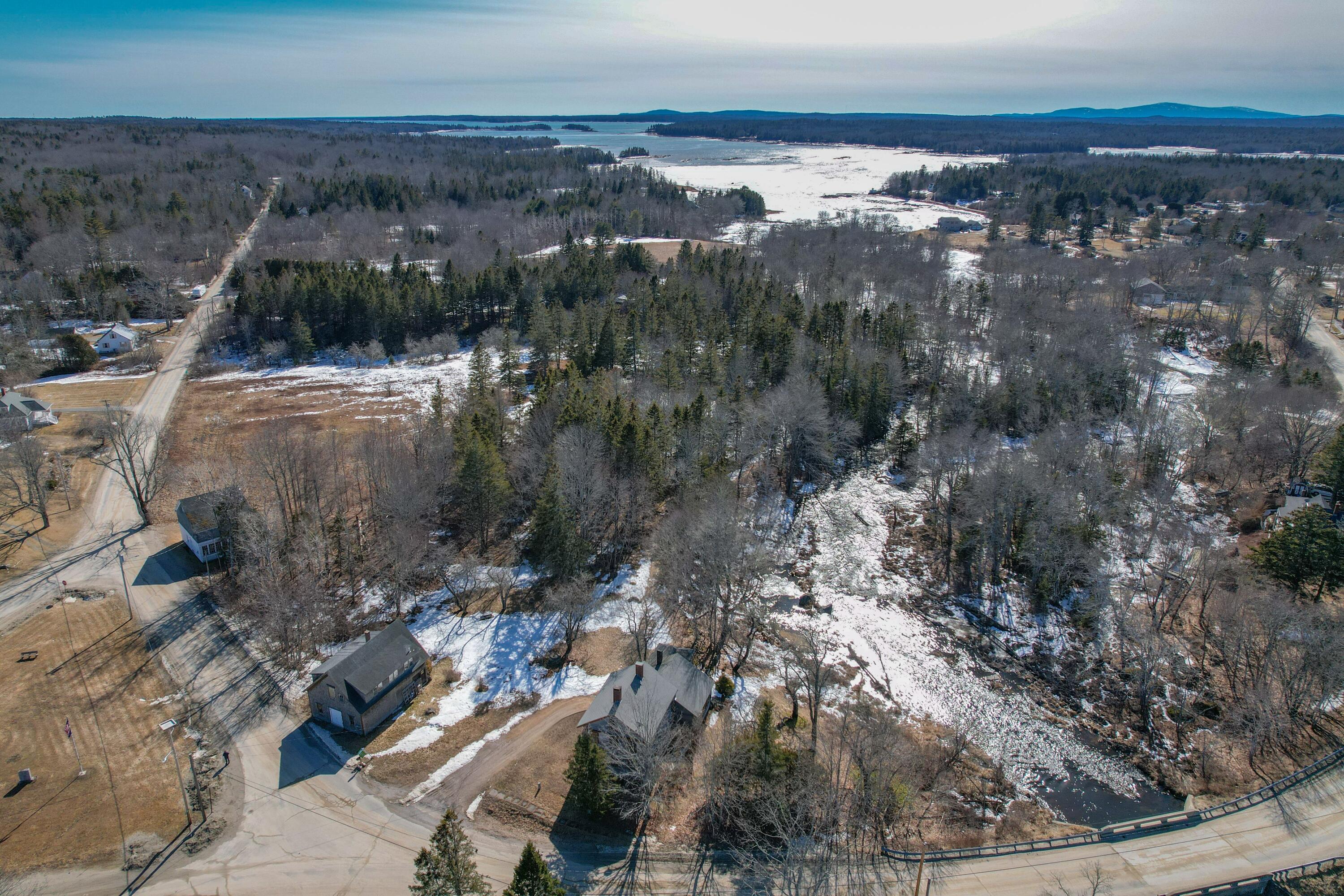 3 Rogers Point Road Steuben, ME 04680 - Photo 35 of 35 Buildings in foreground on road.