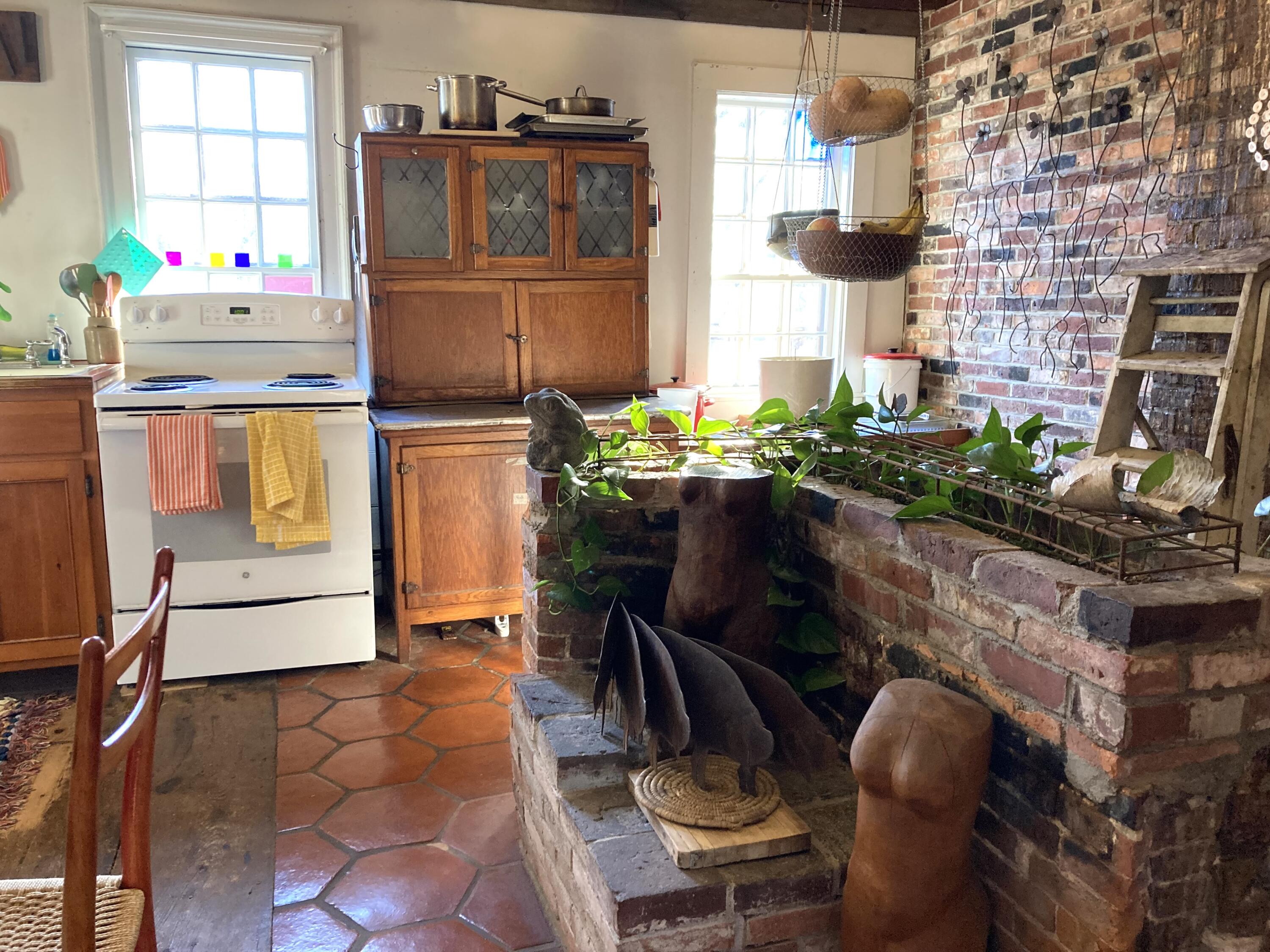 3 Rogers Point Road Steuben, ME 04680 - Photo 7 of 31 Kitchen brick wall.