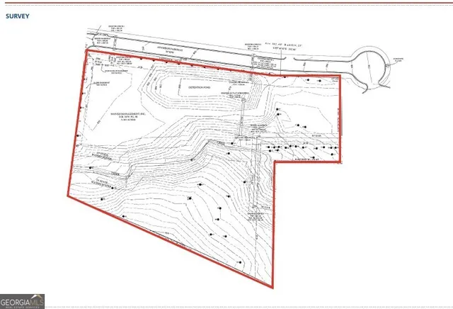 a sign on a street outside a building