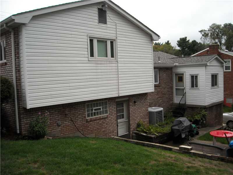 2403 Haymaker Road Monroeville, PA 15146 - Photo 17 of 19 Exterior Back. Back of home with newer siding.