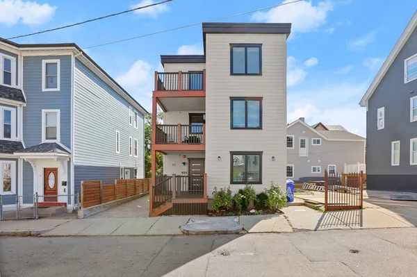 a house with a bench in front of it