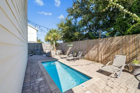 a outdoor living space with patio furniture and a garden