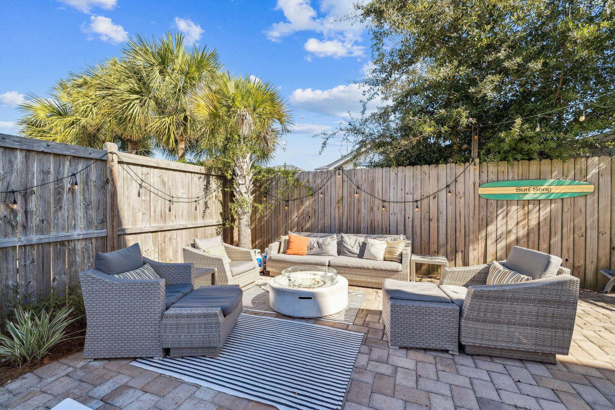 10 Blue Surf Lane Miramar Beach, FL 32550 - Photo 19 of 50 a outdoor living space with patio furniture and a garden