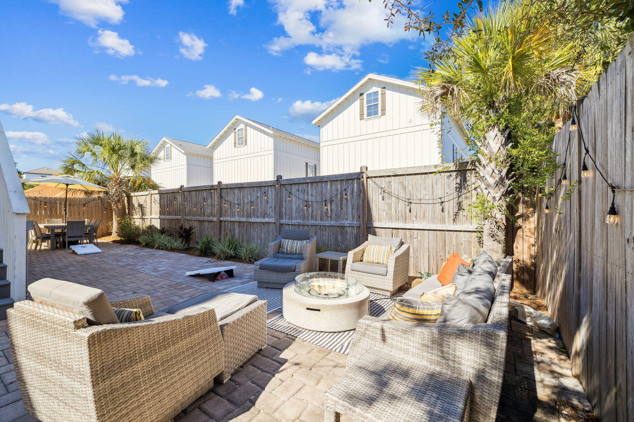 10 Blue Surf Lane Miramar Beach, FL 32550 - Photo 20 of 50 a view of a patio with couches and potted plants