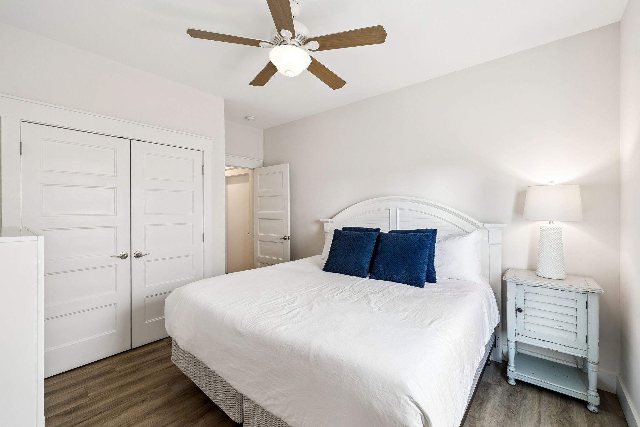 10 Blue Surf Lane Miramar Beach, FL 32550 - Photo 25 of 50 a bedroom with a large bed and a chandelier