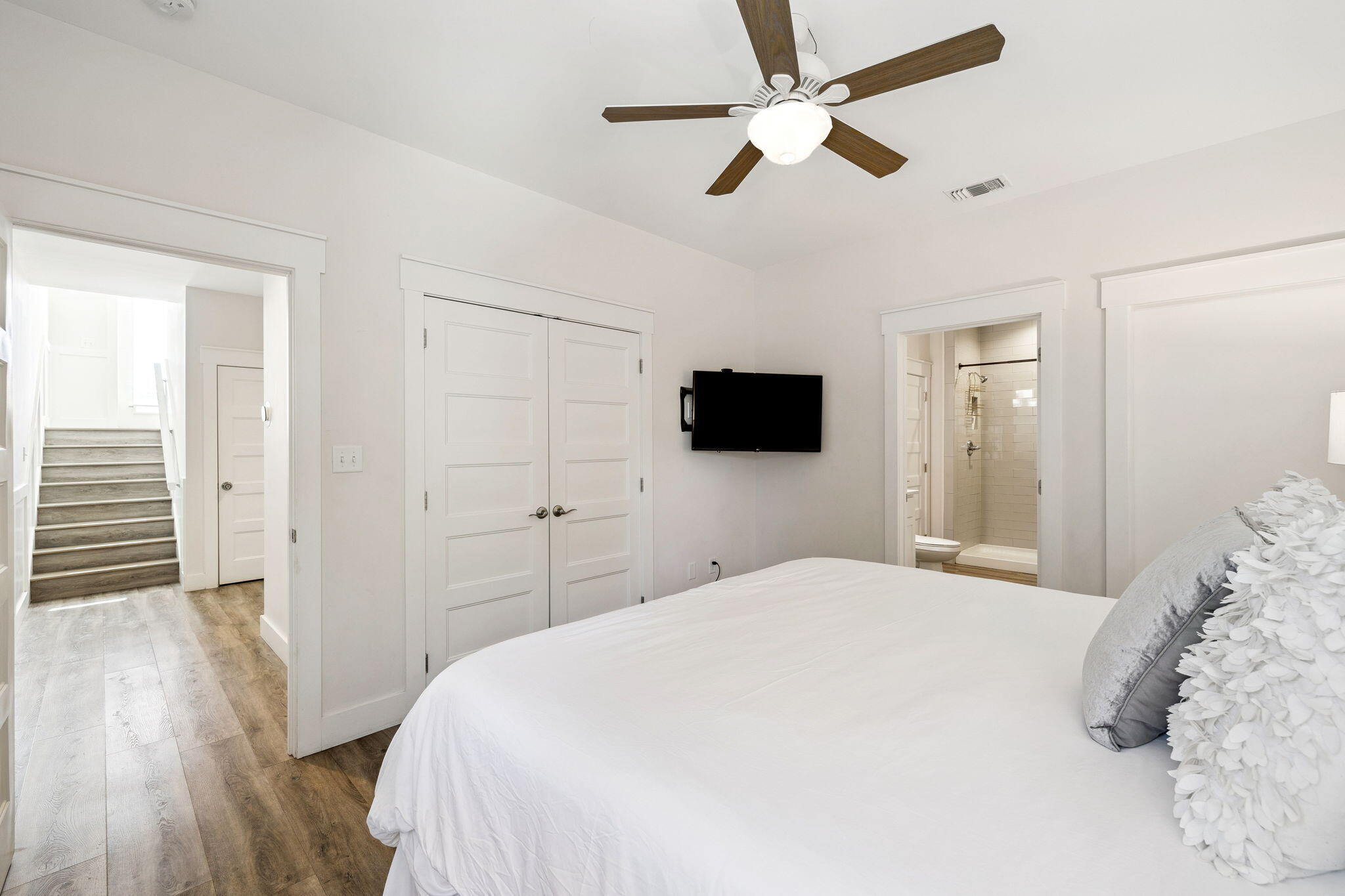 10 Blue Surf Lane Miramar Beach, FL 32550 - Photo 30 of 50 a bedroom with a bed and a flat screen tv