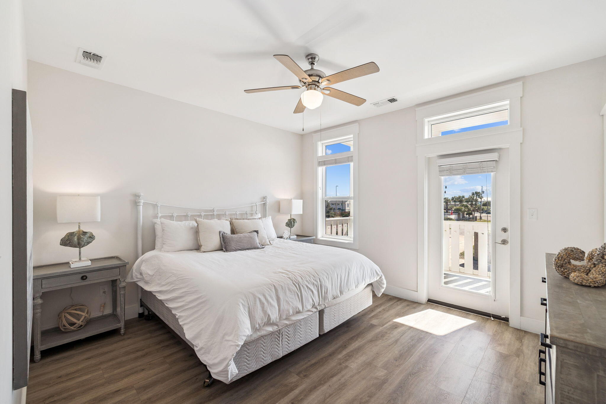 10 Blue Surf Lane Miramar Beach, FL 32550 - Photo 31 of 50 a bedroom with a bed and wooden floor