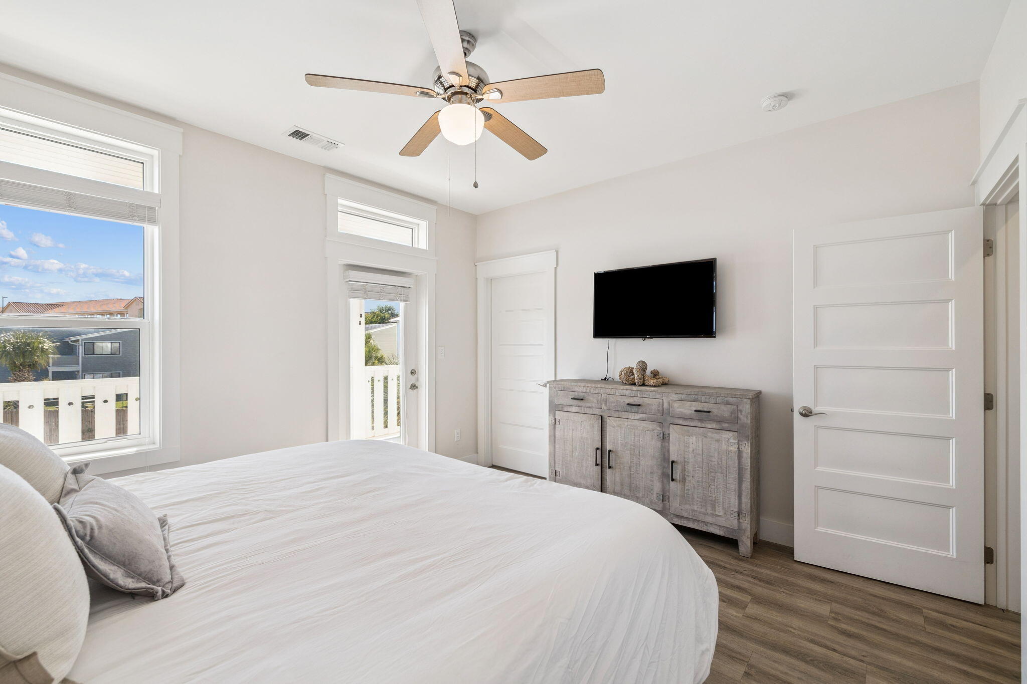 10 Blue Surf Lane Miramar Beach, FL 32550 - Photo 32 of 50 a bedroom with a flat screen tv and a bed