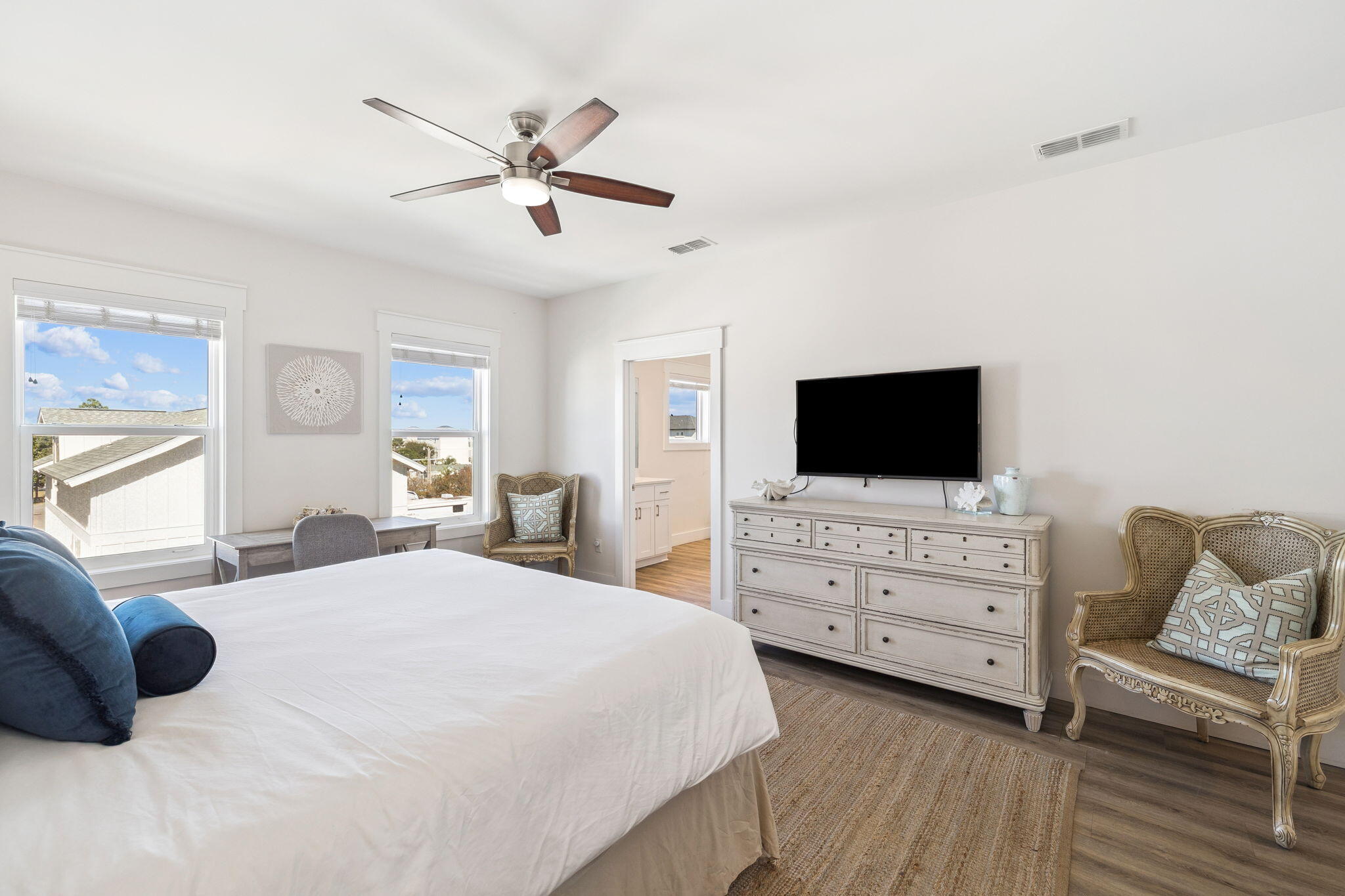 10 Blue Surf Lane Miramar Beach, FL 32550 - Photo 37 of 50 a bedroom with a bed and a flat screen tv