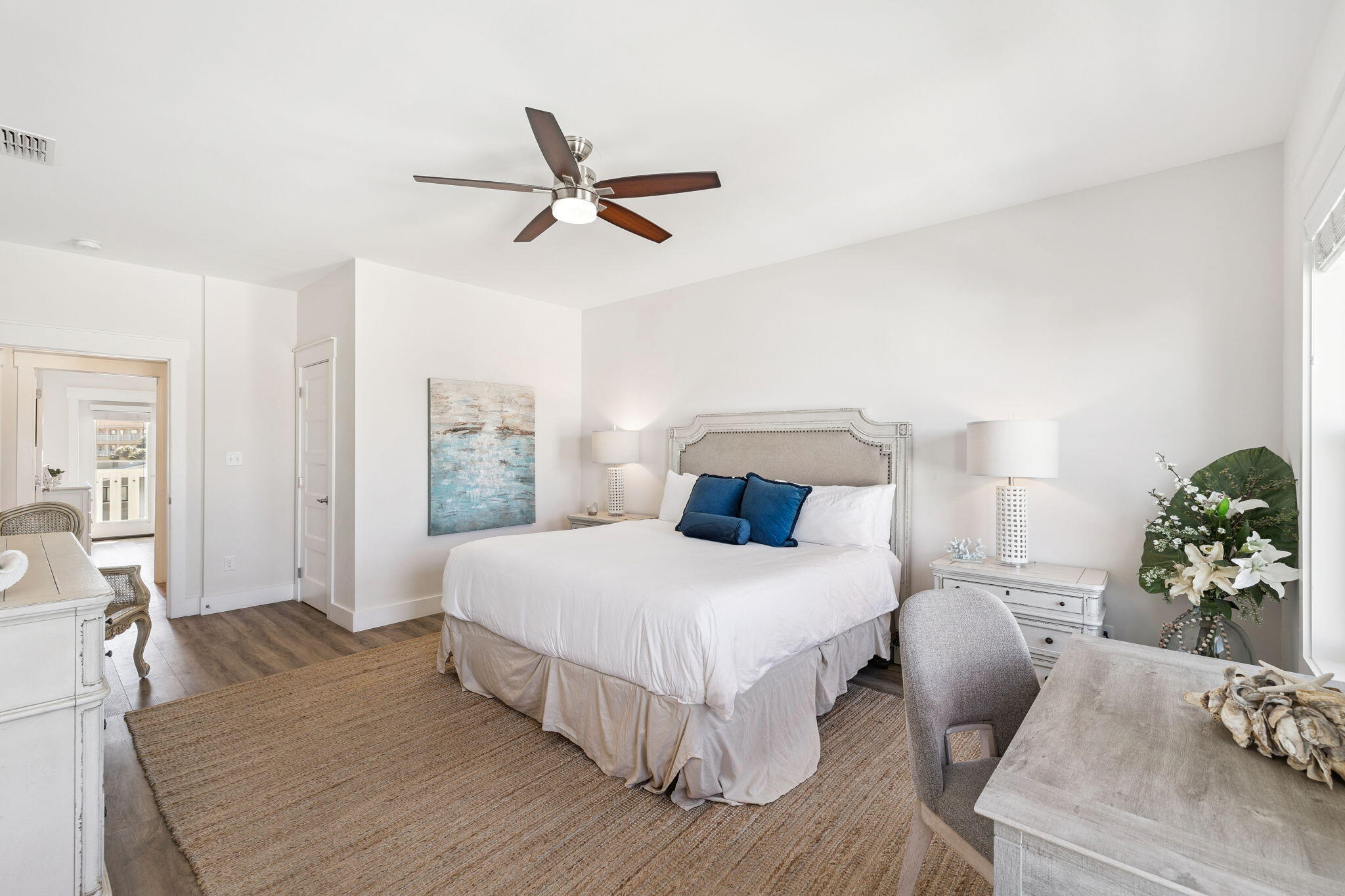 10 Blue Surf Lane Miramar Beach, FL 32550 - Photo 38 of 50 a bedroom with a bed table flowerpot and window