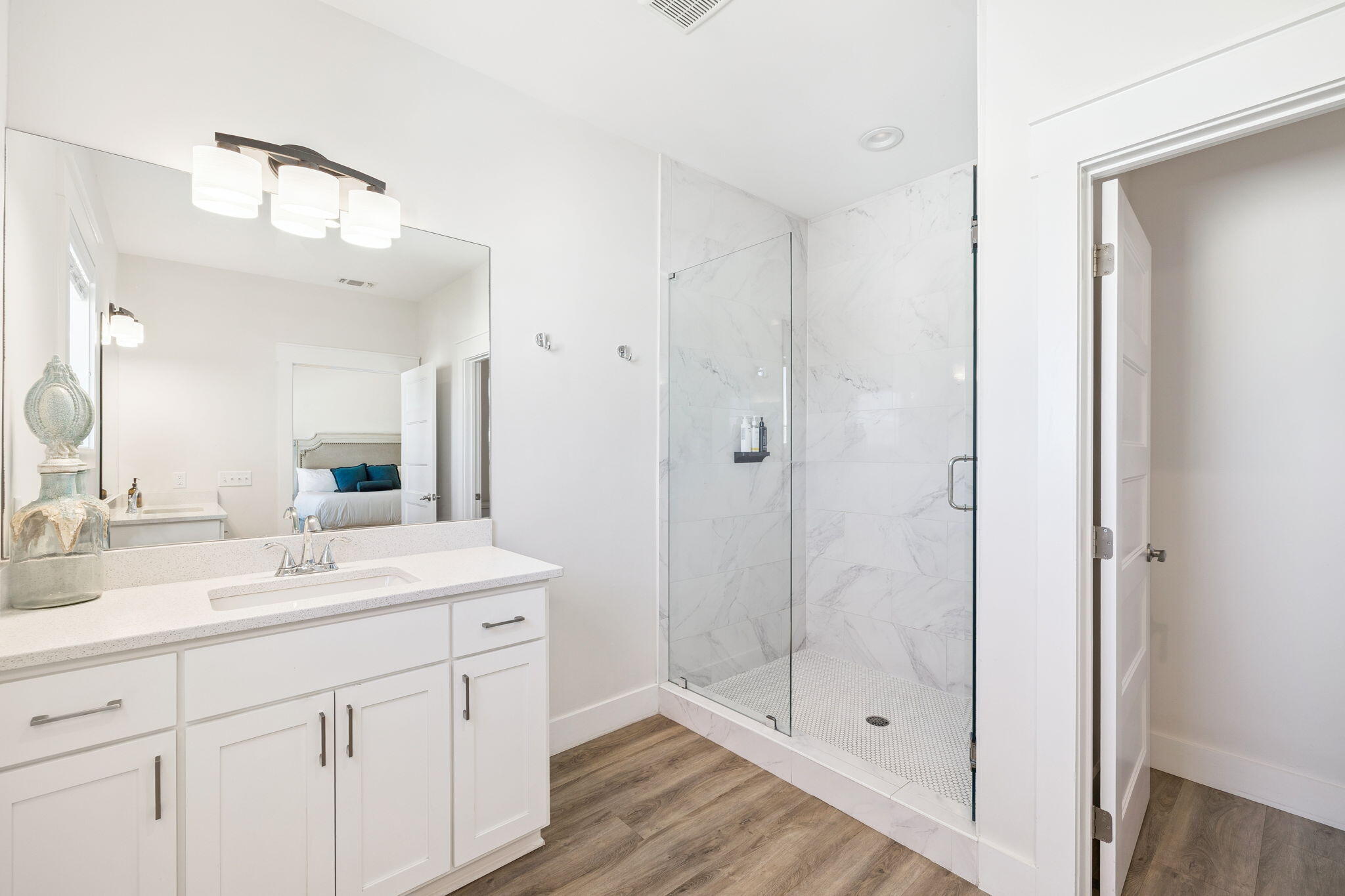 10 Blue Surf Lane Miramar Beach, FL 32550 - Photo 41 of 50 a bathroom with a shower sink and mirror