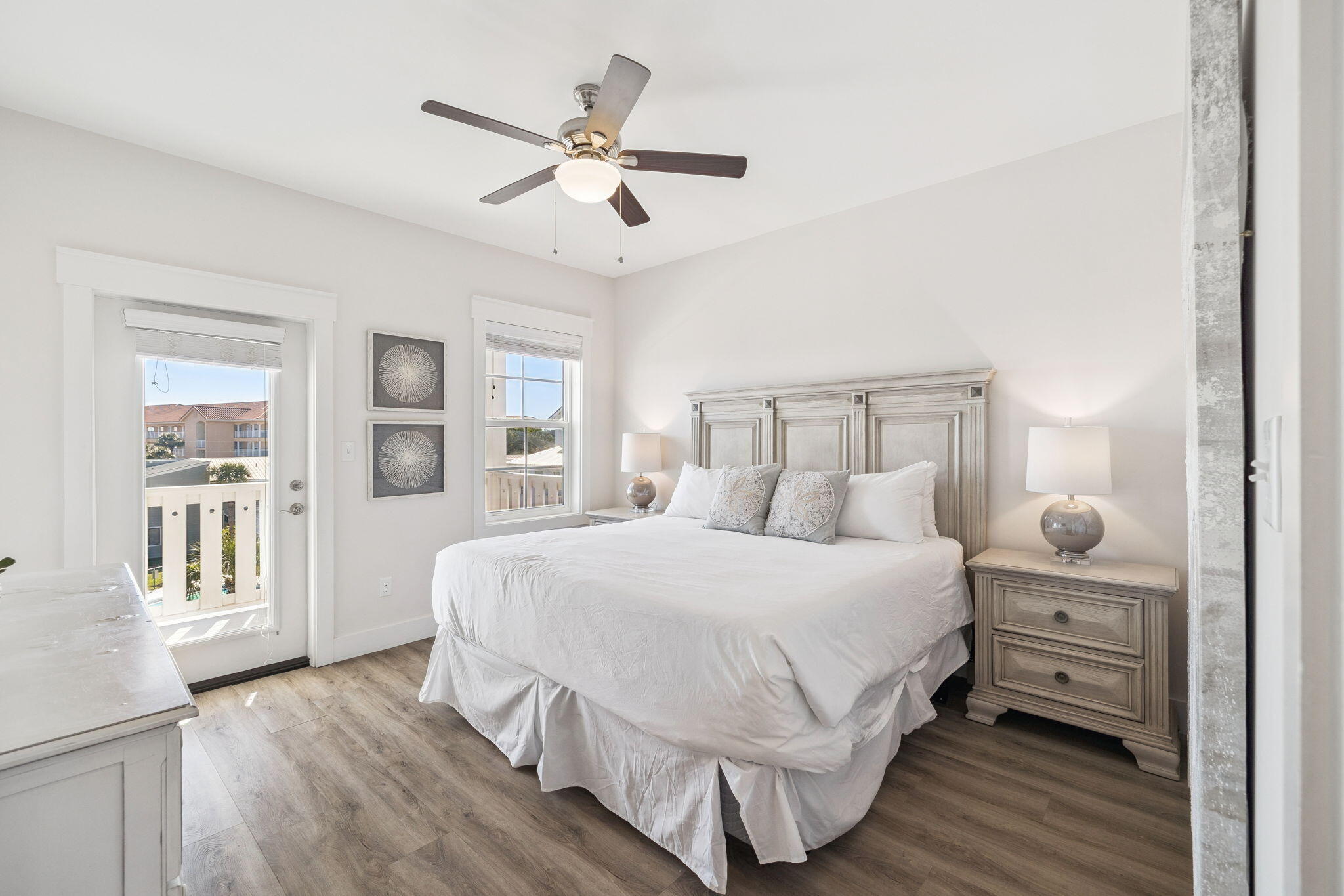 10 Blue Surf Lane Miramar Beach, FL 32550 - Photo 45 of 50 a bedroom with a large bed and a chandelier