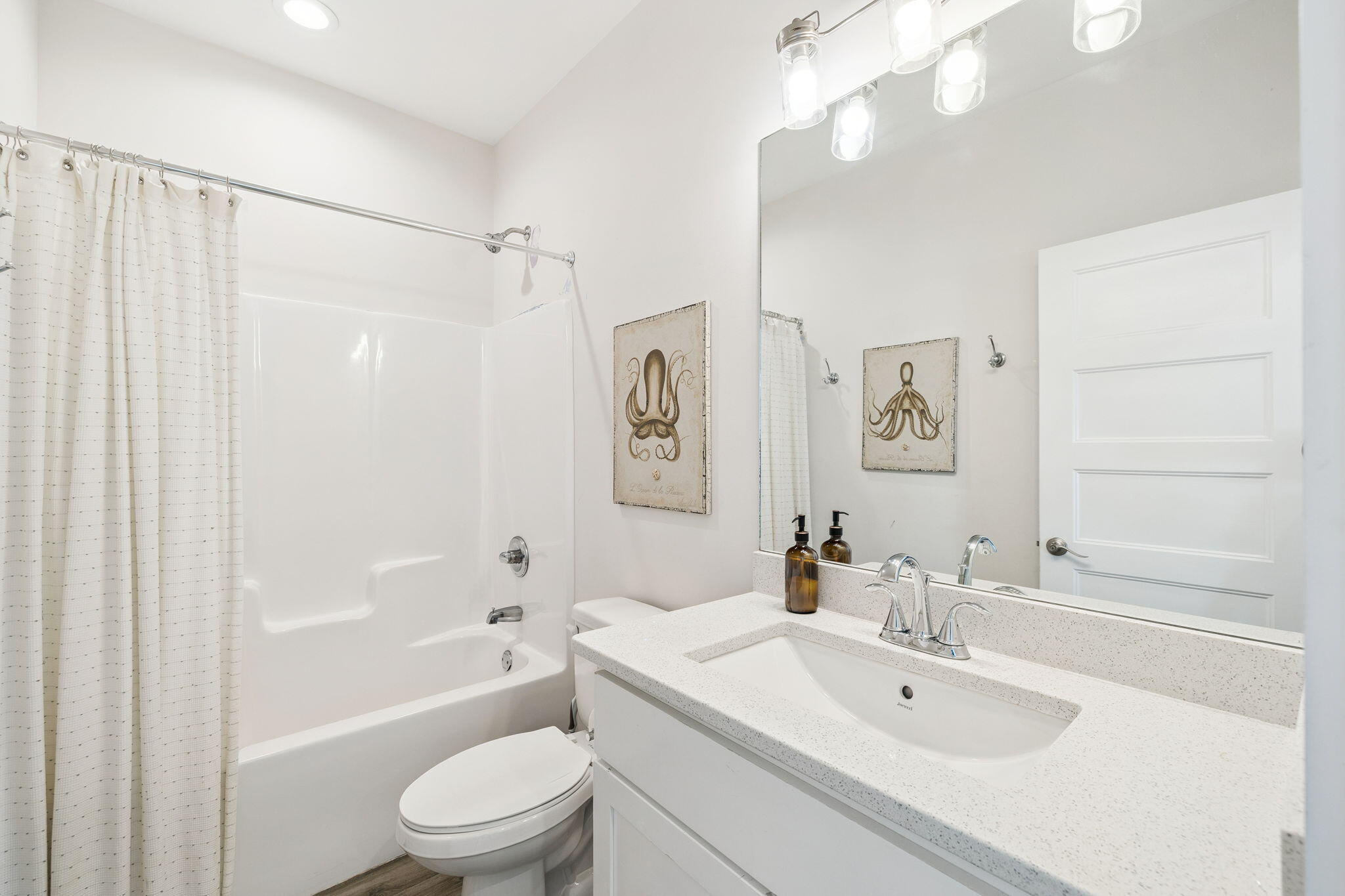 10 Blue Surf Lane Miramar Beach, FL 32550 - Photo 47 of 50 a bathroom with a sink a toilet and shower
