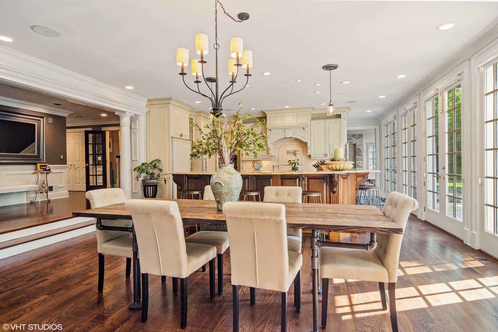 1717 Appleby Road Inverness, IL 60067 - Photo 11 of 57 a view of a dining room with furniture wooden floor and chandelier
