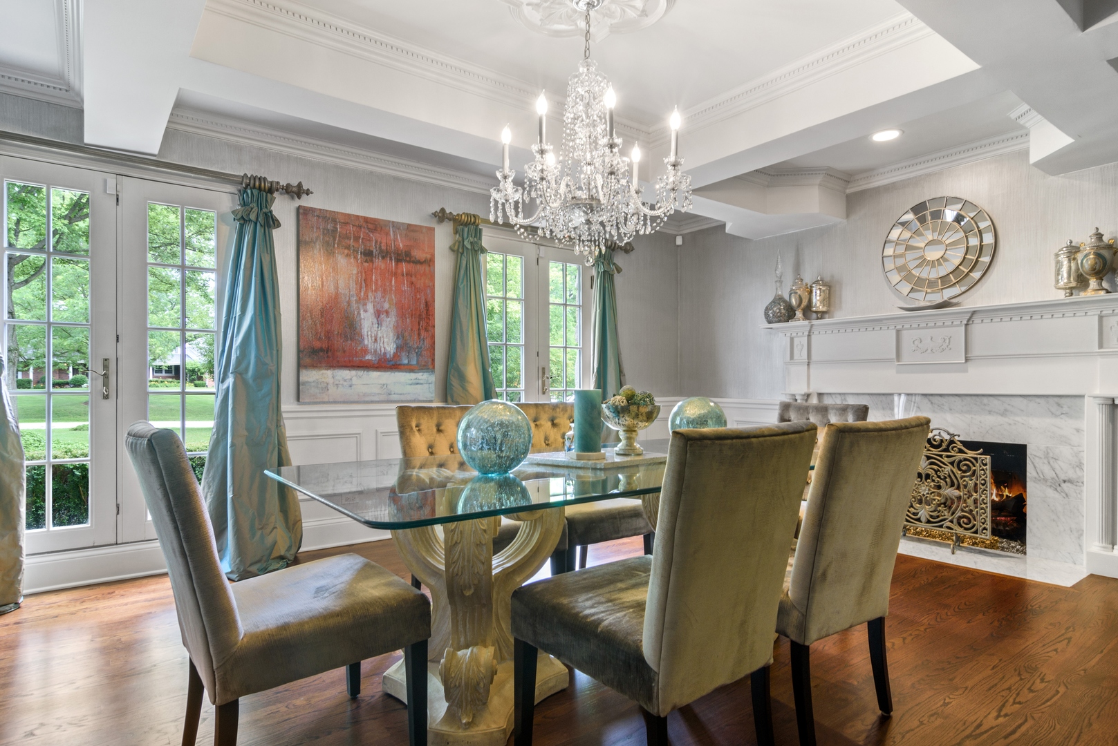 1717 Appleby Road Inverness, IL 60067 - Photo 14 of 57 a view of a dining room with furniture a chandelier and wooden floor