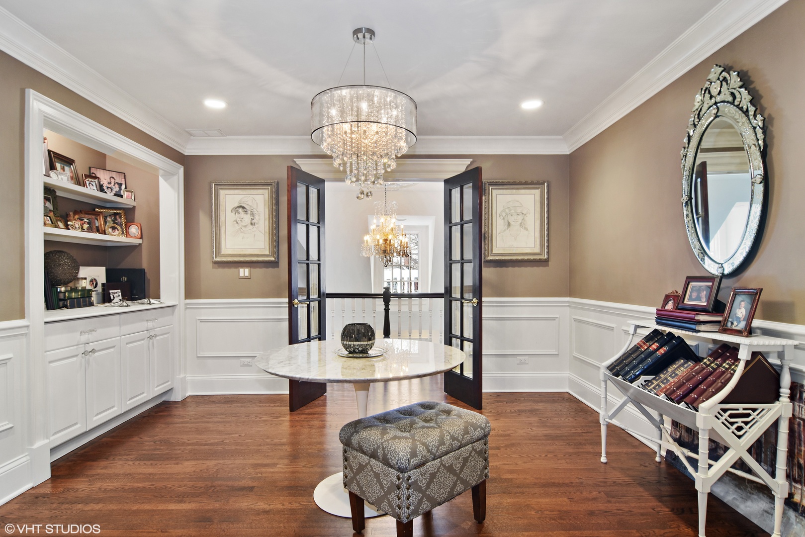 1717 Appleby Road Inverness, IL 60067 - Photo 30 of 57 a view of a dining room with furniture a chandelier and wooden floor