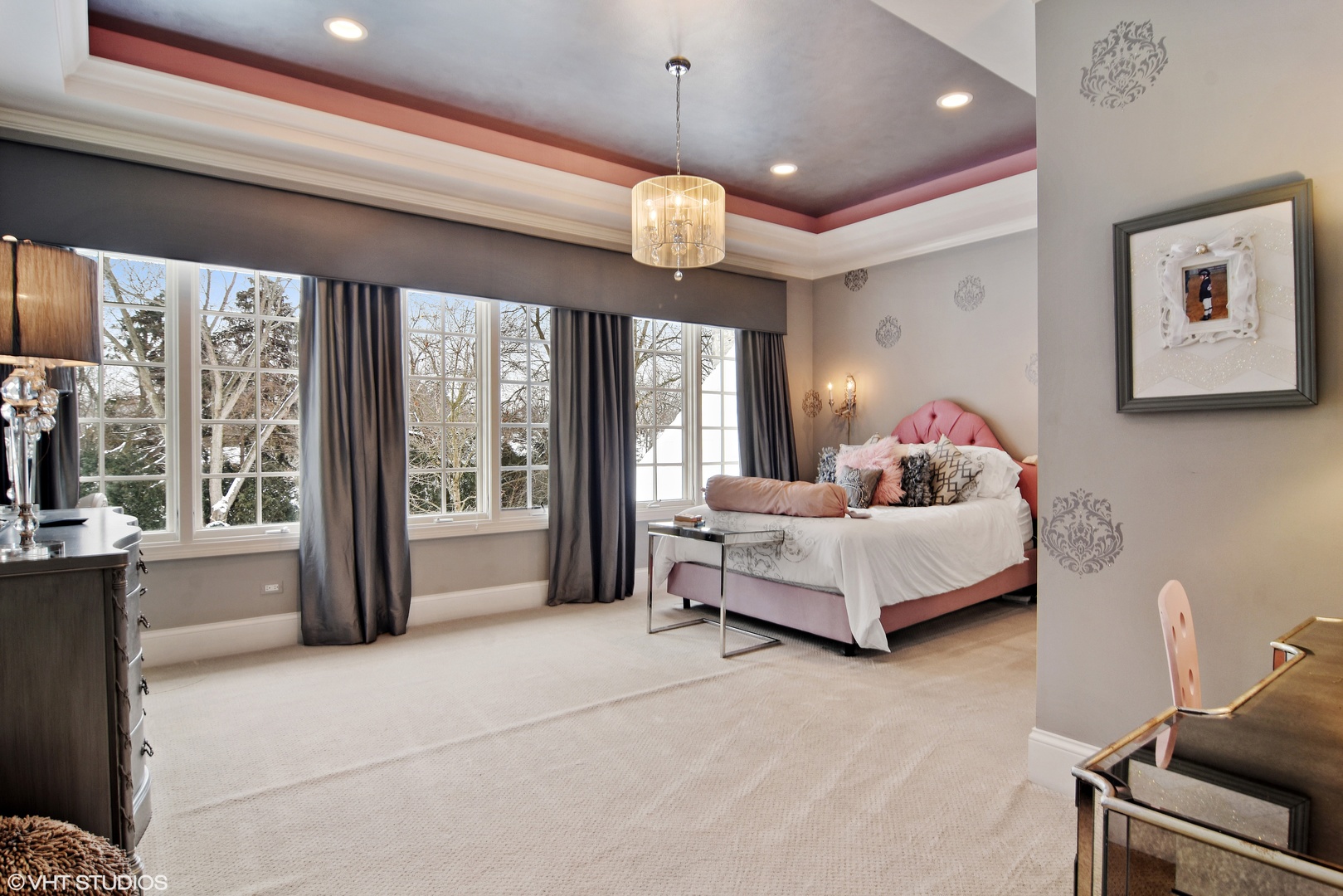 1717 Appleby Road Inverness, IL 60067 - Photo 34 of 57 a spacious bedroom with a bed and a large window with the outer view