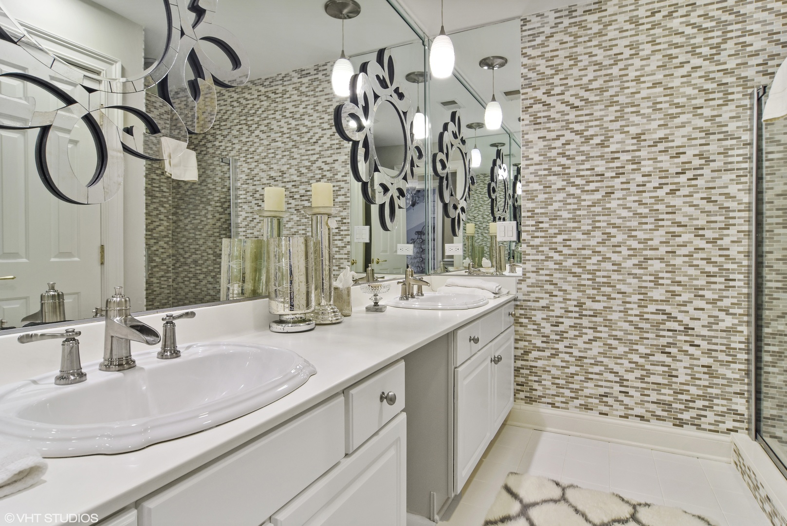 1717 Appleby Road Inverness, IL 60067 - Photo 37 of 57 a bathroom with a sink a mirror and shower