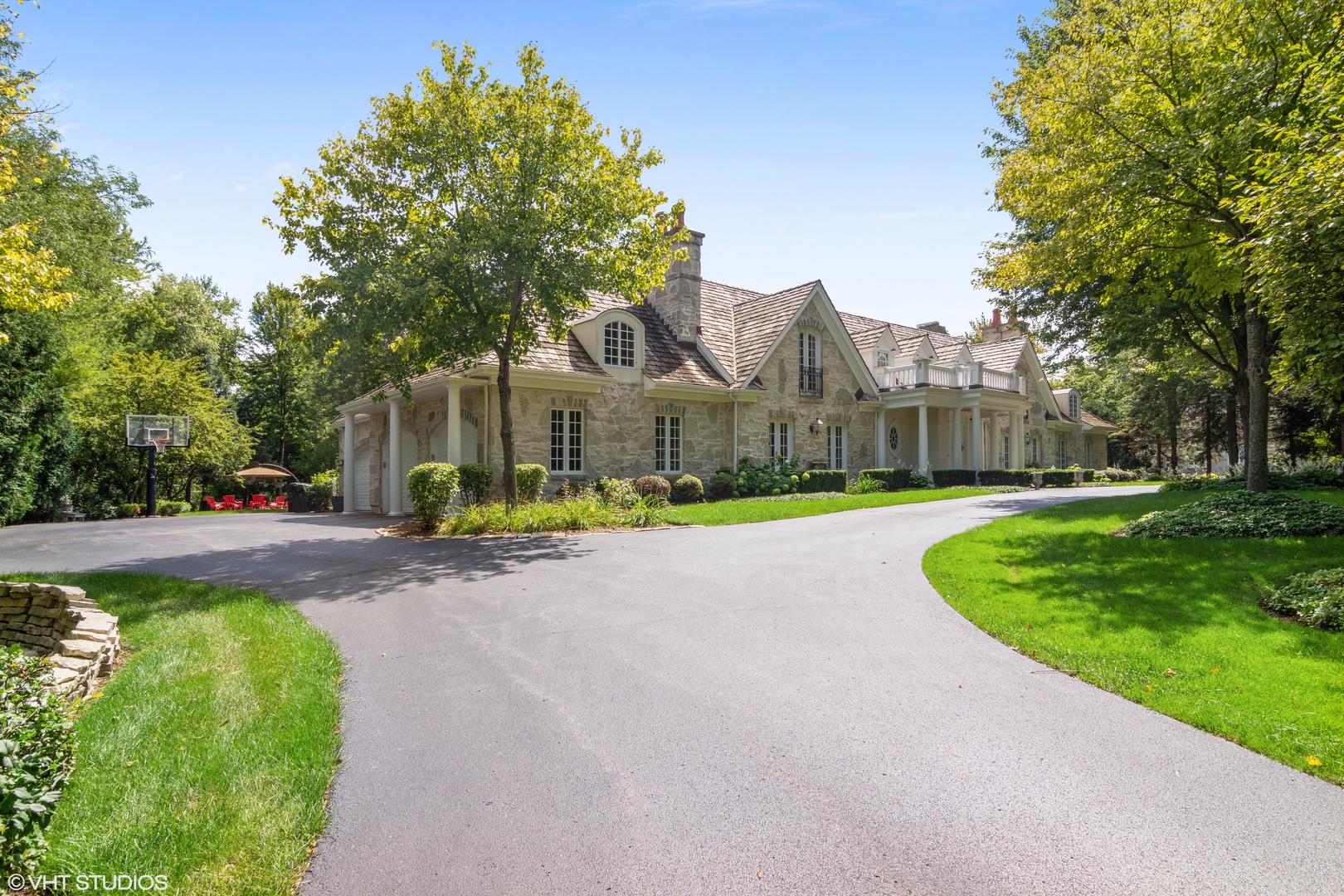 1717 Appleby Road Inverness, IL 60067 - Photo 45 of 57 a view of a house with a big yard plants and large trees
