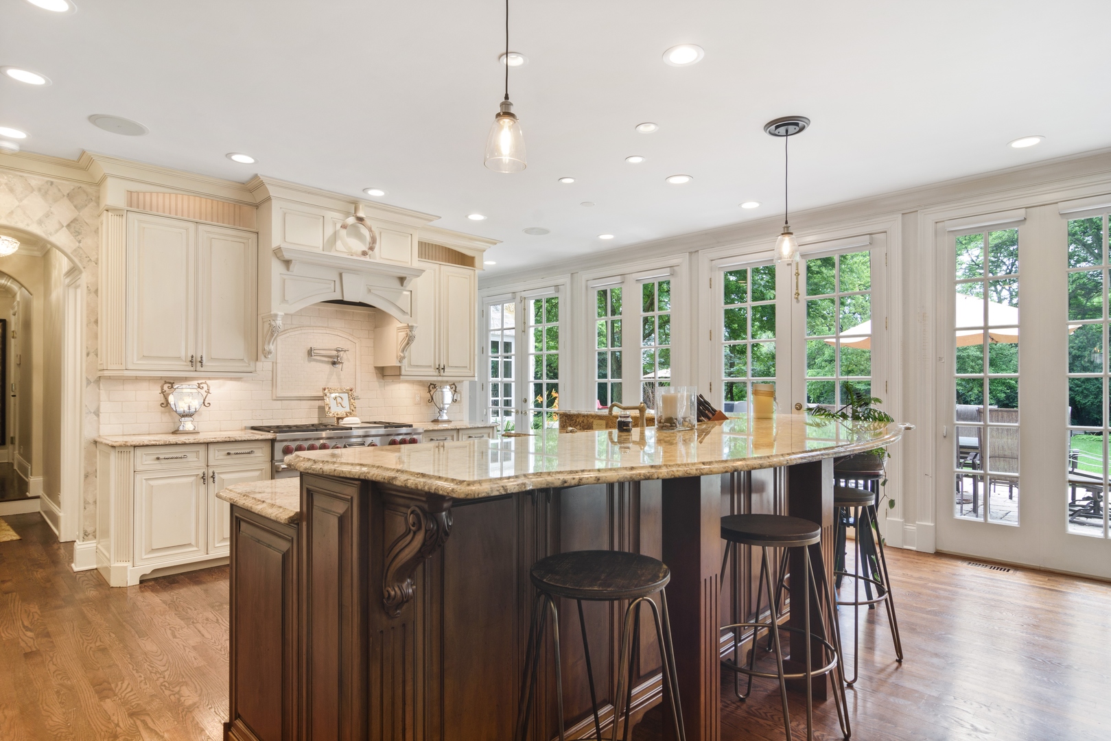 1717 Appleby Road Inverness, IL 60067 - Photo 8 of 57 a kitchen with a table chairs stove and cabinets