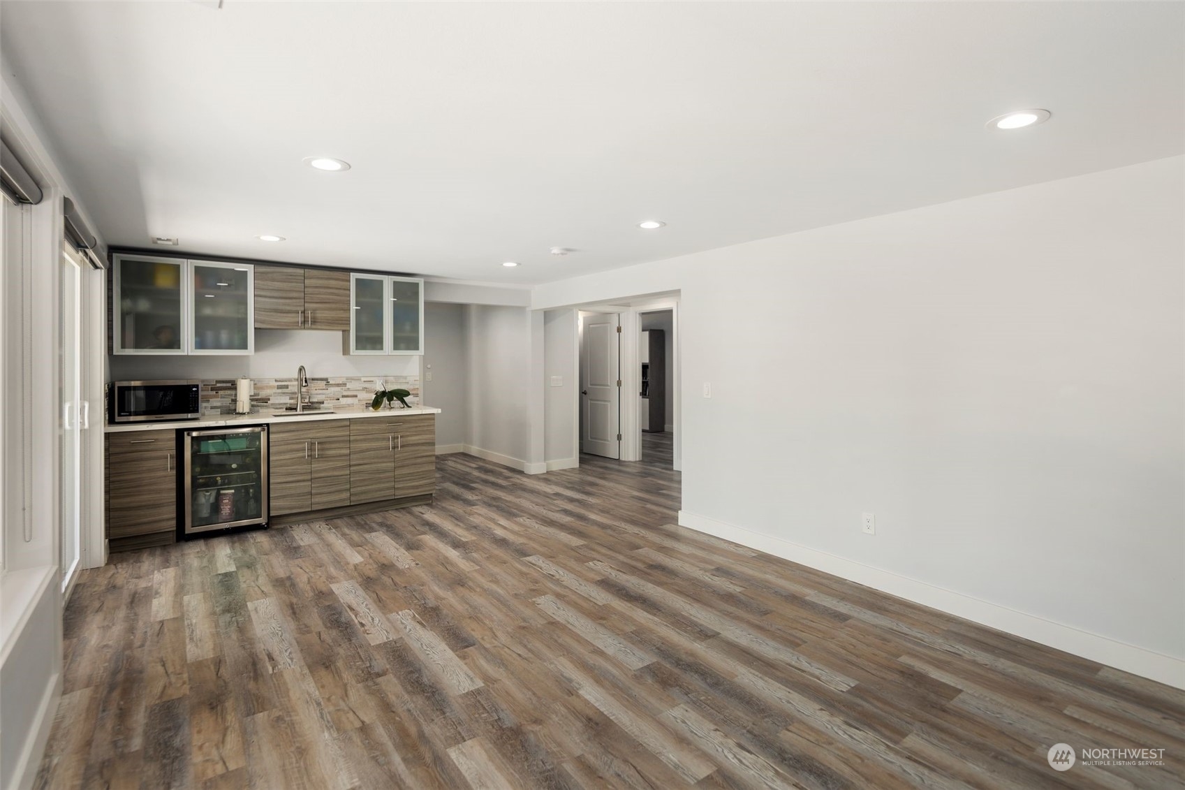 102 Bellflower Road Bothell, WA 98012 - Photo 20 of 40 a view of kitchen with wooden floor