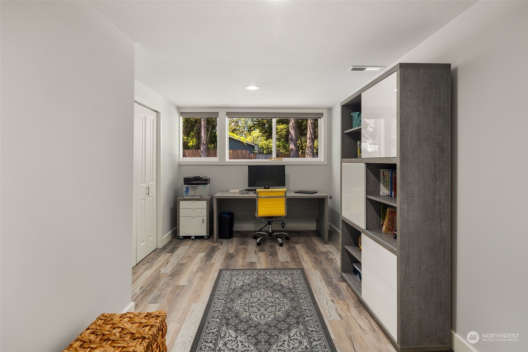 102 Bellflower Road Bothell, WA 98012 - Photo 25 of 40 a living room with furniture and a window