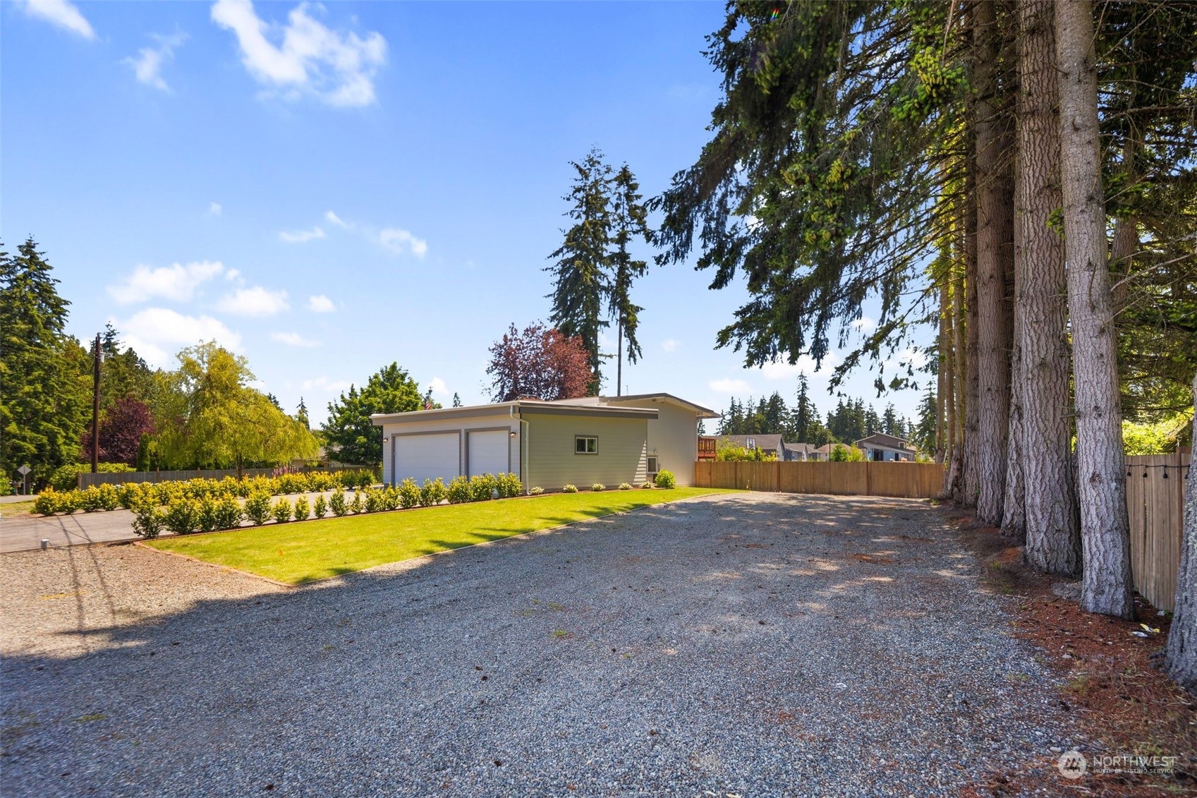 102 Bellflower Road Bothell, WA 98012 - Photo 32 of 40 a view of swimming pool with outdoor seating and yard in back