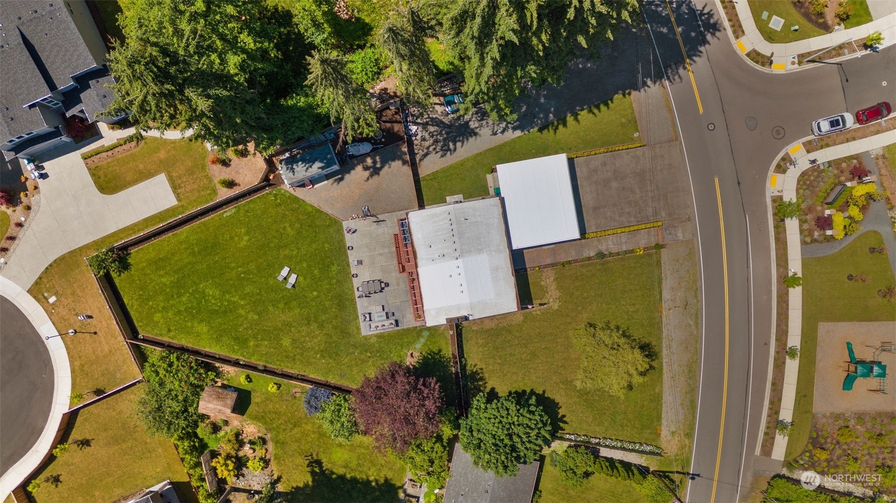 102 Bellflower Road Bothell, WA 98012 - Photo 34 of 40 aerial view of a house with swimming pool and outdoor seating