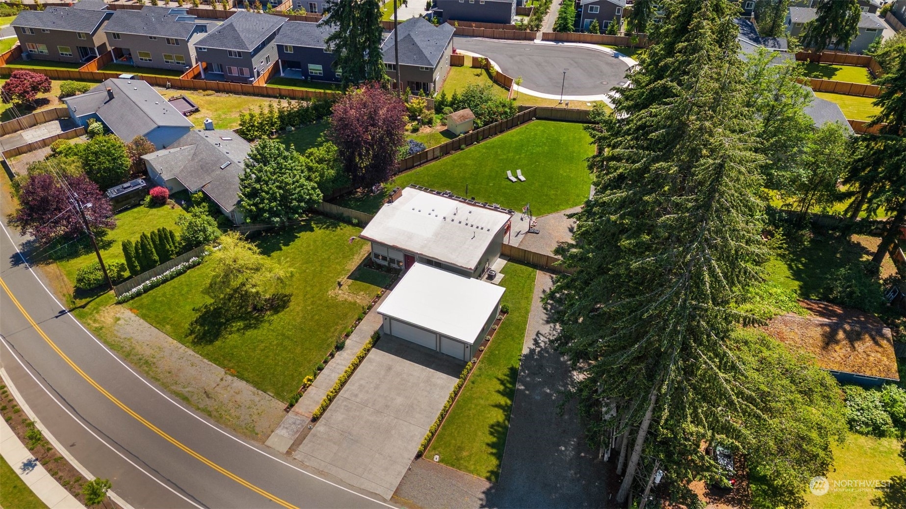 102 Bellflower Road Bothell, WA 98012 - Photo 36 of 40 an aerial view of a house with swimming pool and outdoor seating