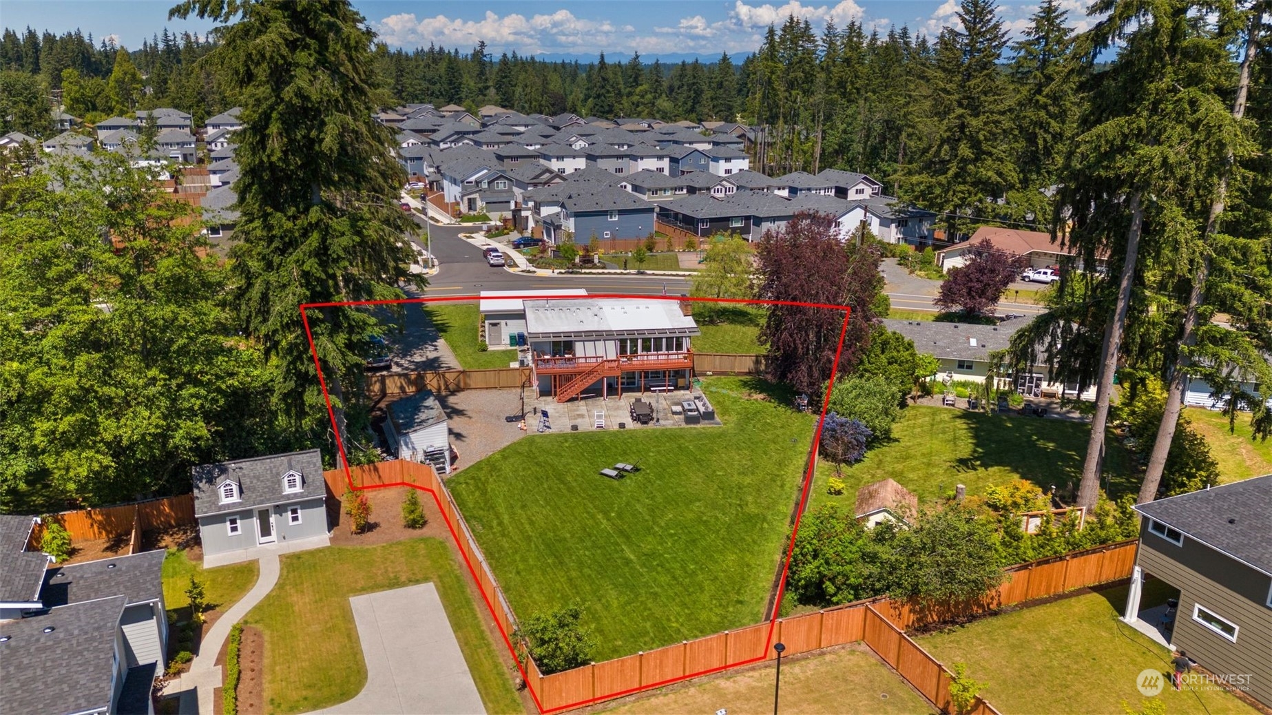 102 Bellflower Road Bothell, WA 98012 - Photo 40 of 40 an aerial view of a house with a garden