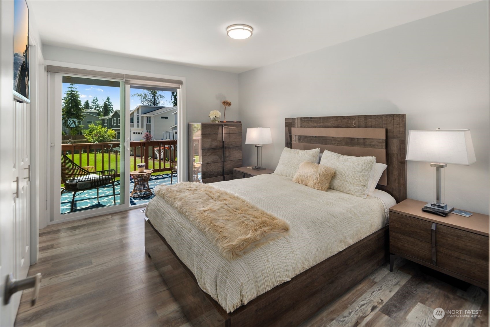 102 Bellflower Road Bothell, WA 98012 - Photo 10 of 40 a spacious bedroom with a bed and a window