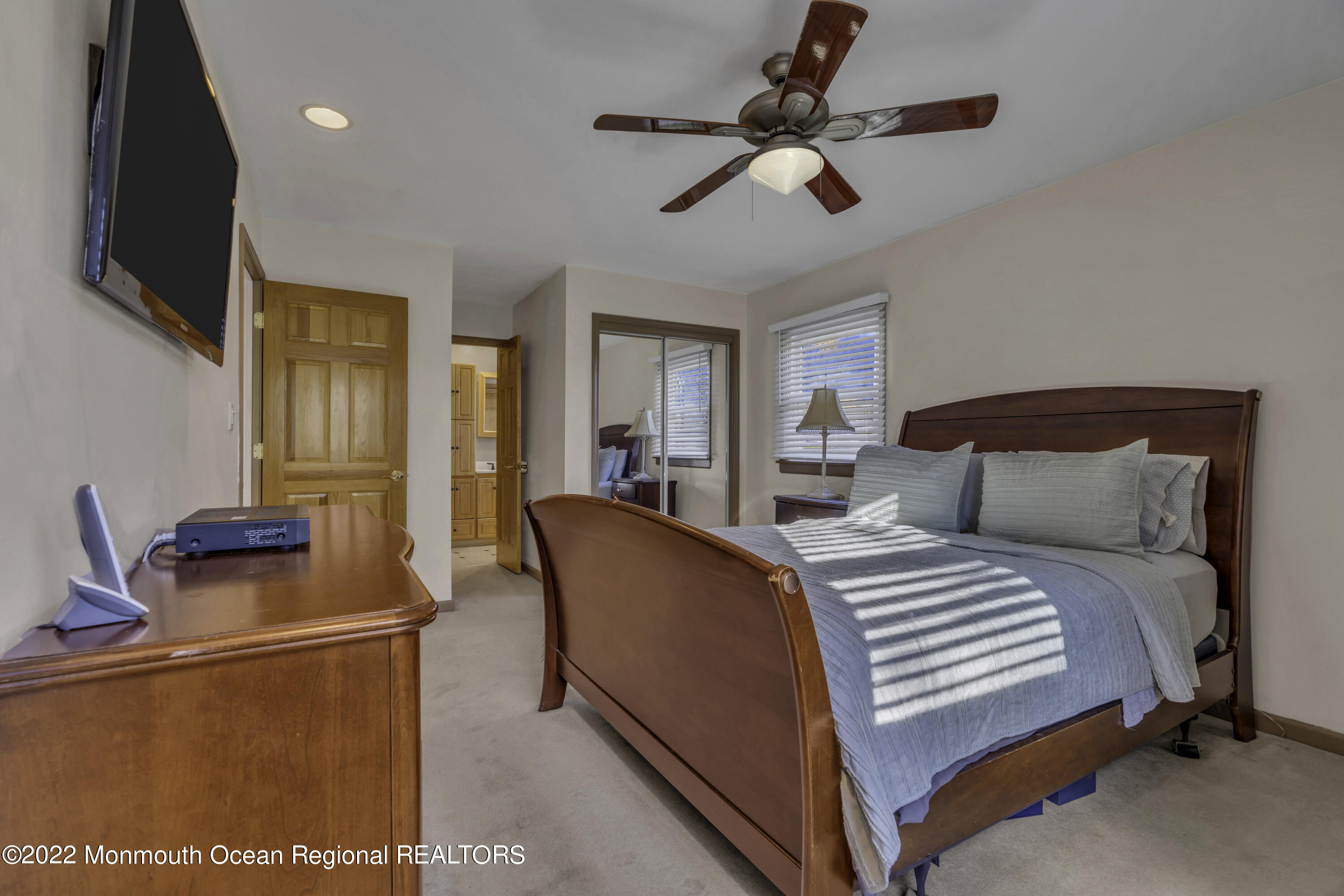 115 Greymoor Road Howell, NJ 07731 - Photo 15 of 38 a bedroom with a bed and wooden floor