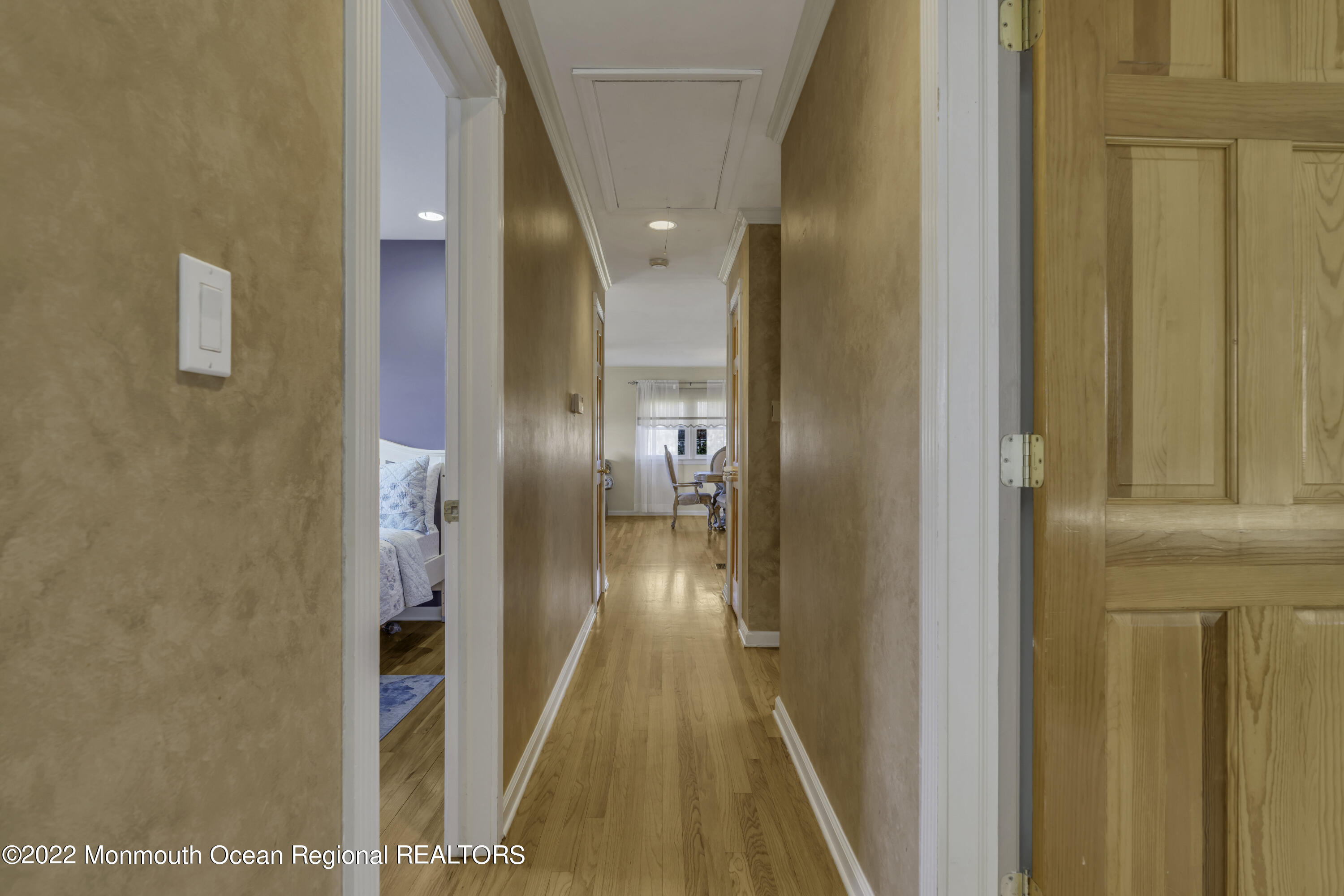 115 Greymoor Road Howell, NJ 07731 - Photo 18 of 38 a view of hallway with wooden floor
