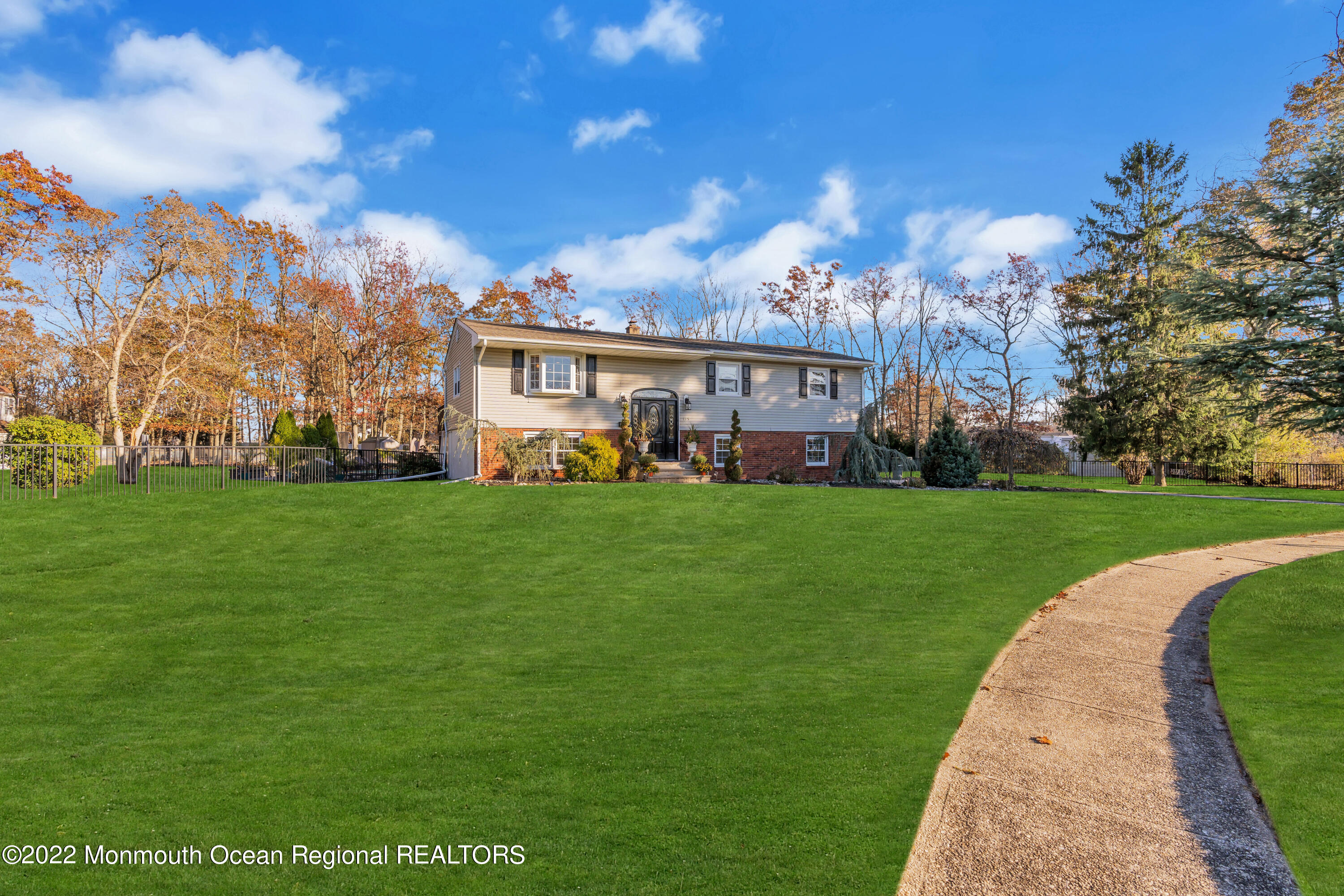 115 Greymoor Road Howell, NJ 07731 - Photo 2 of 38 a view of a house with a big yard