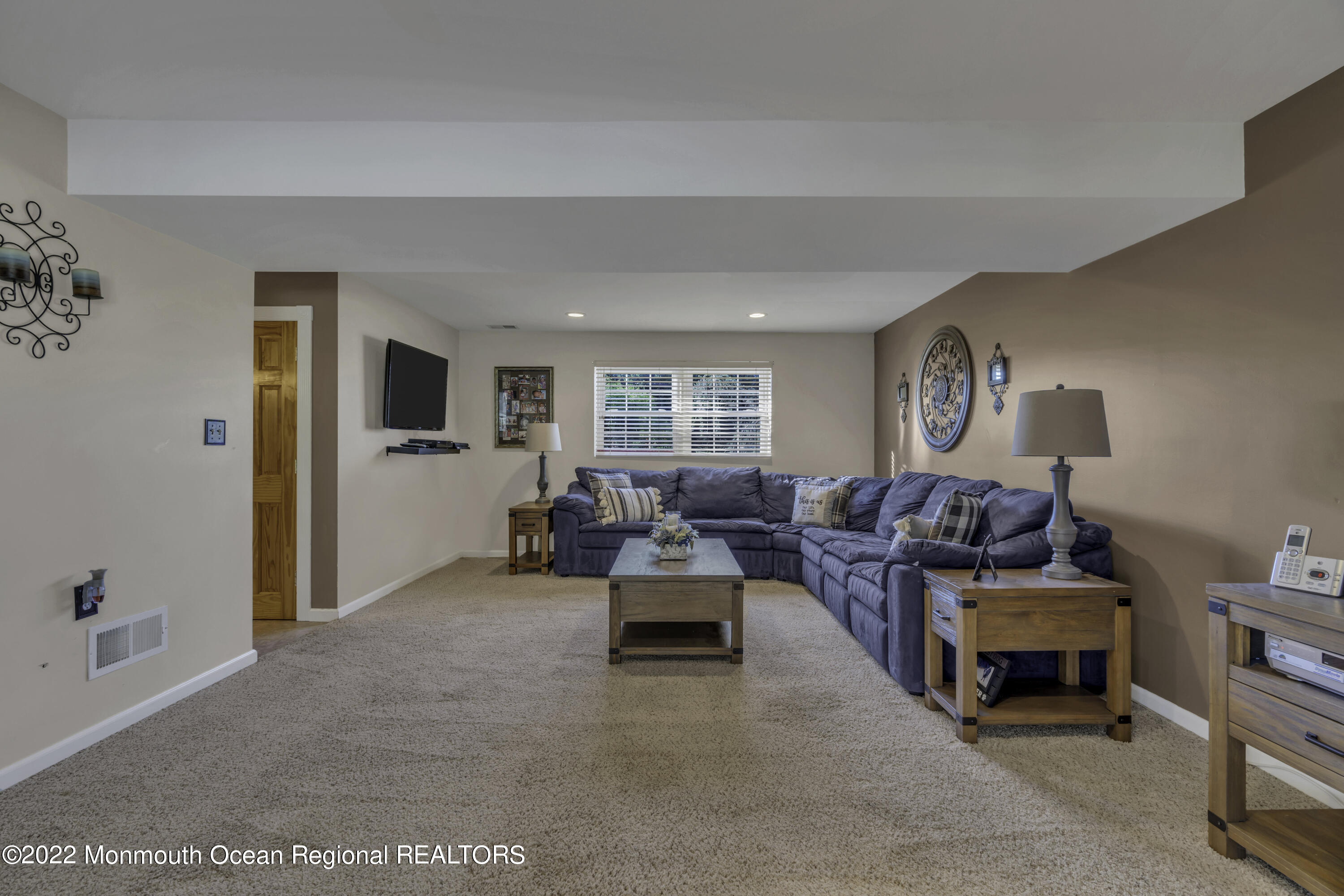 115 Greymoor Road Howell, NJ 07731 - Photo 21 of 38 a living room with furniture and a window