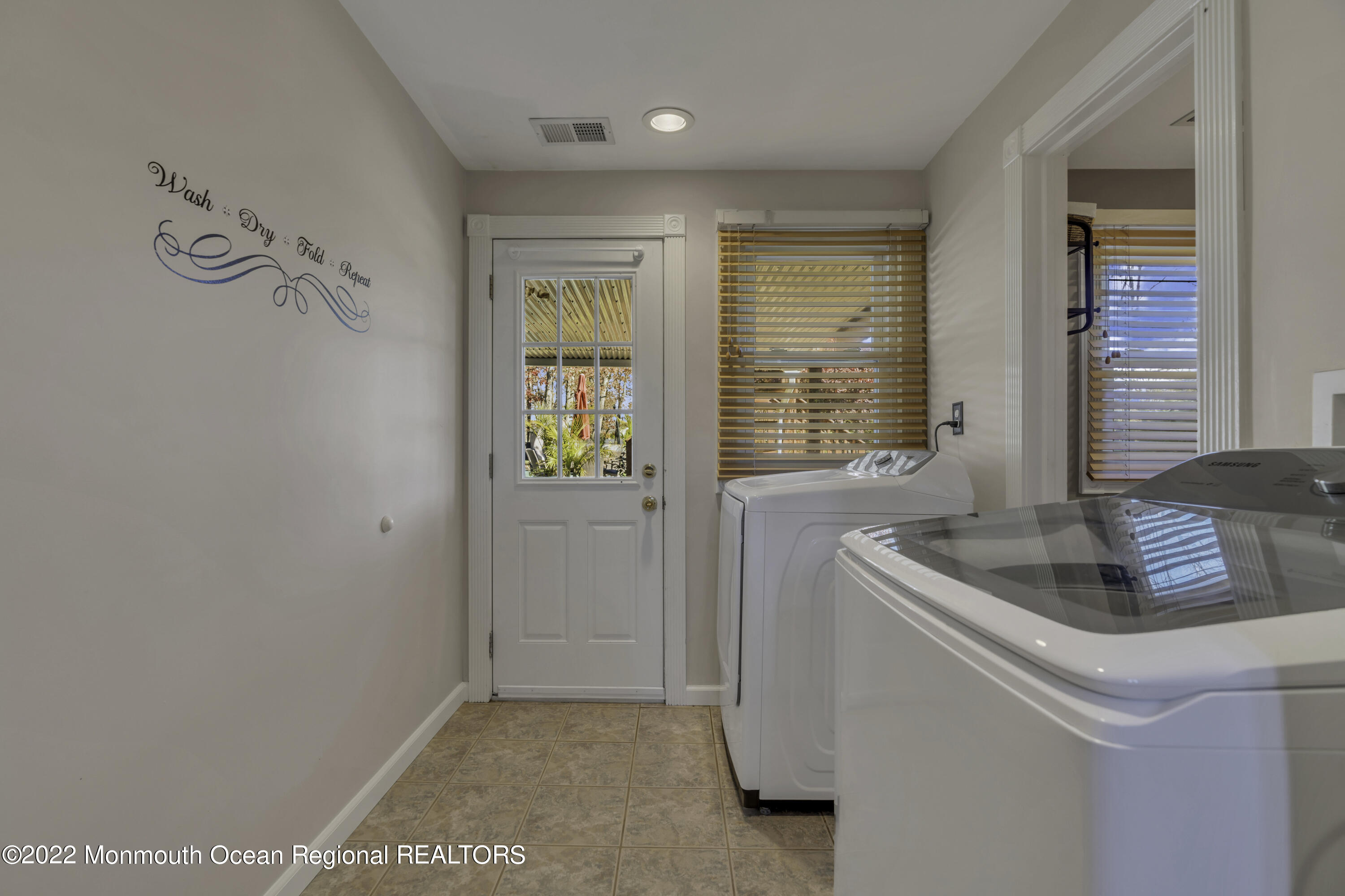 115 Greymoor Road Howell, NJ 07731 - Photo 24 of 38 a kitchen that has a sink and a stove