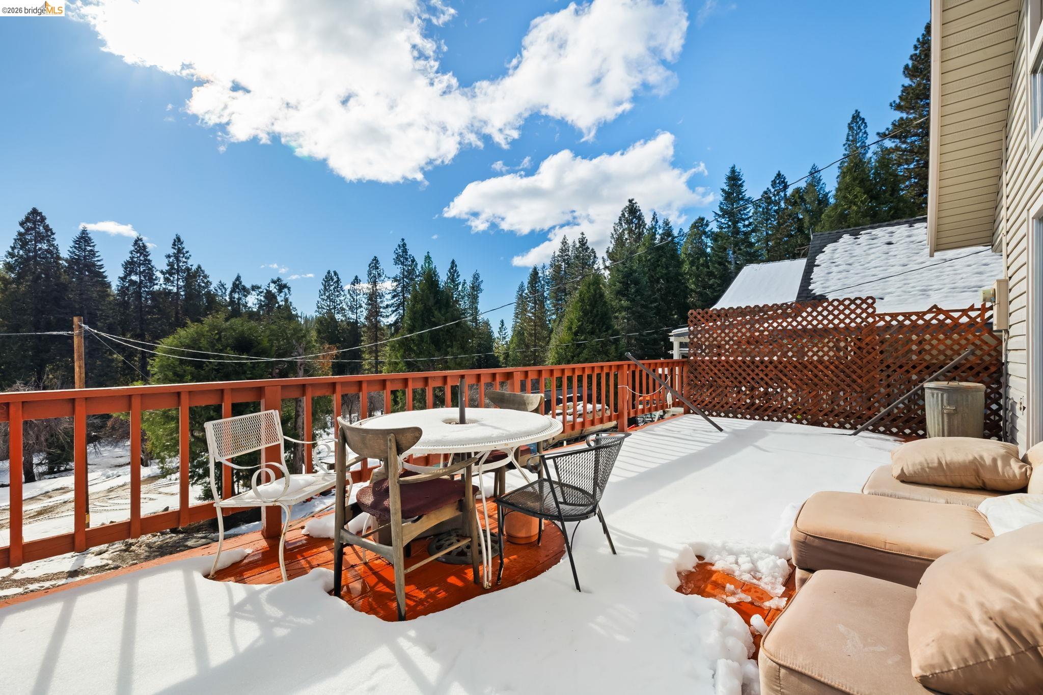 26039 Long Barn Road Long Barn, CA 95335 - Photo 26 of 27 Wooden terrace with outdoor dining area