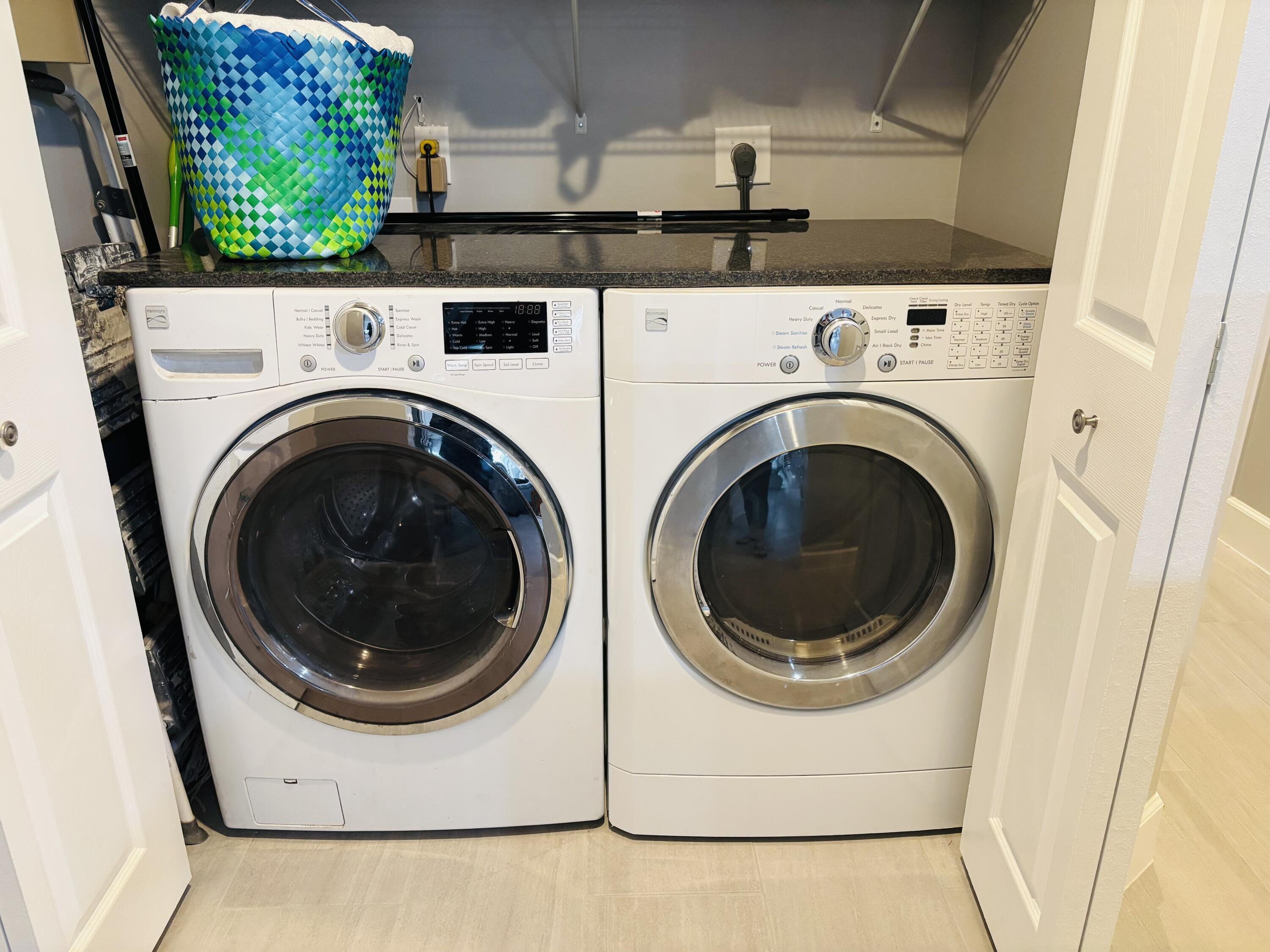 222 Southeast 3rd Street Boynton Beach, FL 33435 - Photo 16 of 40 a utility room with dryer and washer