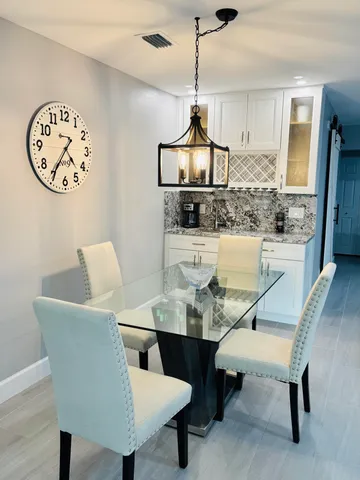a view of a dining room with furniture