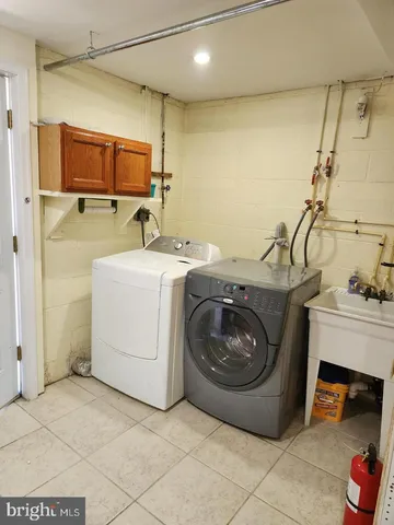 an empty room with a wooden door