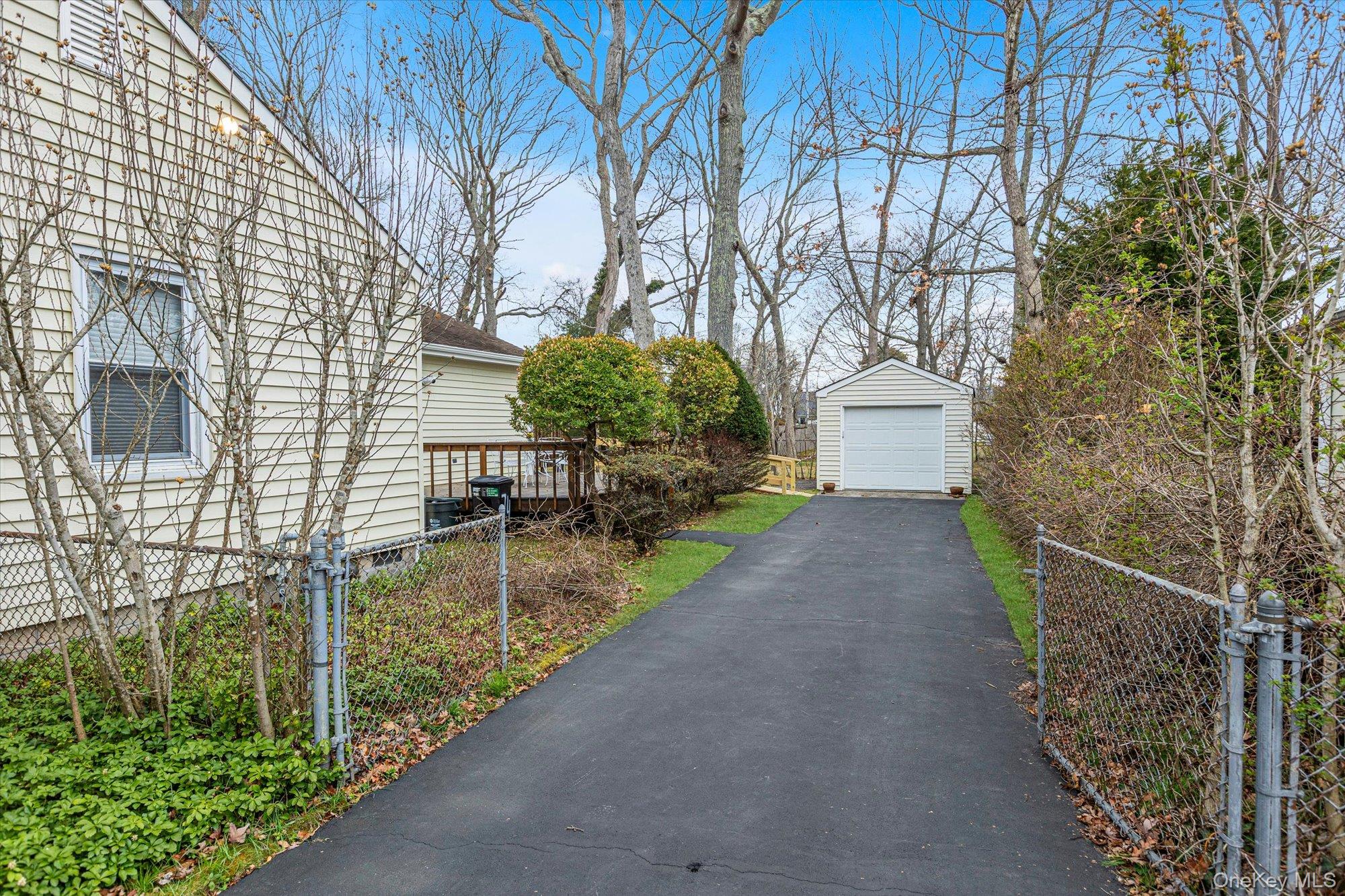 74 Country Club Road Bellport, NY 11713 - Photo 19 of 21 a view of a back yard