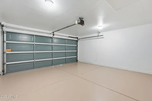 a view of an empty room with empty shelves