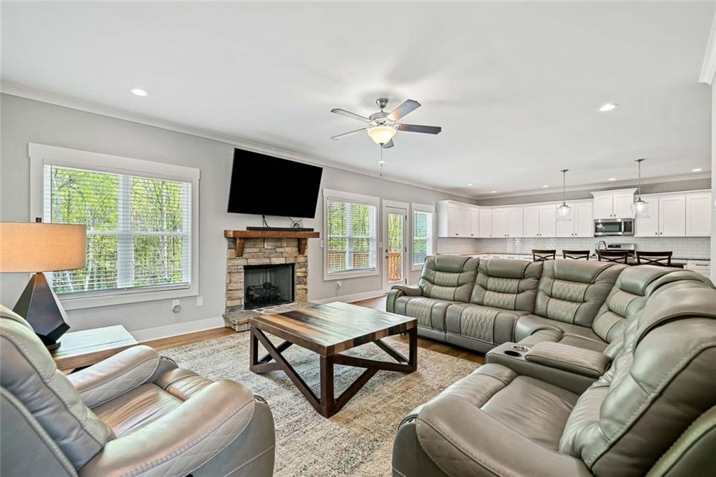2 Village Ridge Jasper, GA 30143 - Photo 13 of 45 a living room with furniture a fireplace and a flat screen tv