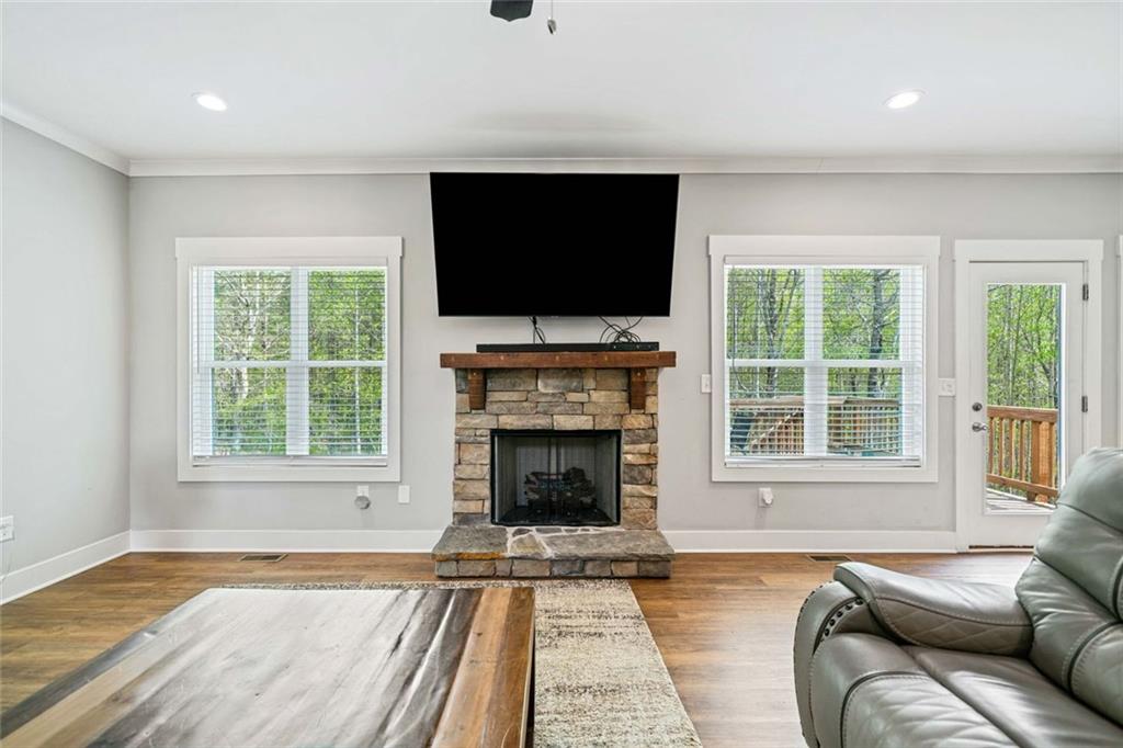 2 Village Ridge Jasper, GA 30143 - Photo 14 of 45 a living room with furniture a flat screen tv and a fireplace