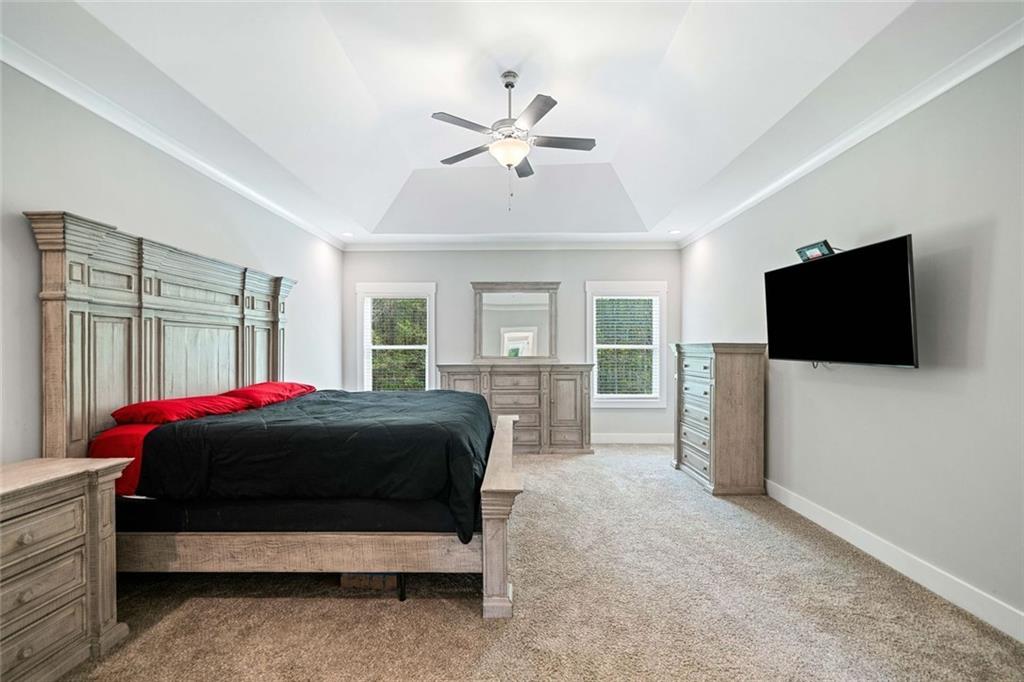 2 Village Ridge Jasper, GA 30143 - Photo 24 of 45 a bedroom with a bed and a flat screen tv