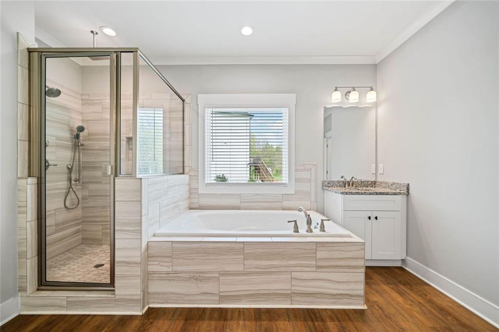 2 Village Ridge Jasper, GA 30143 - Photo 26 of 45 a spacious bathroom with a bathtub and a sink