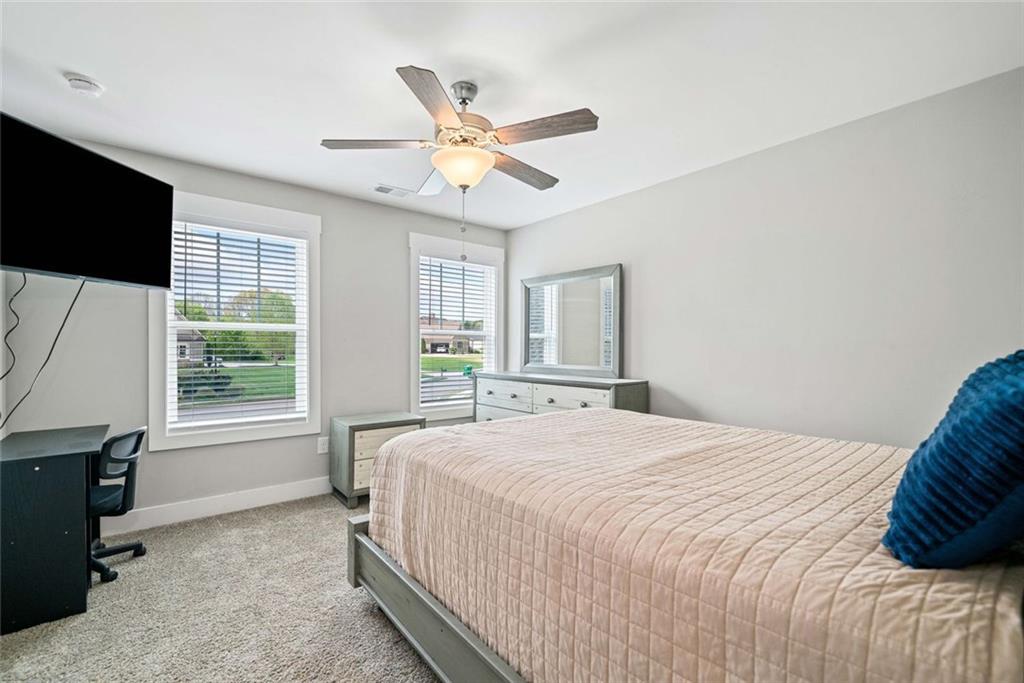 2 Village Ridge Jasper, GA 30143 - Photo 29 of 45 a bedroom with a large bed and a flat tv screen