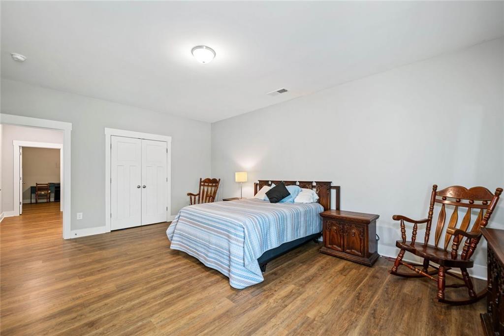 2 Village Ridge Jasper, GA 30143 - Photo 40 of 45 a bedroom with a bed and wooden floor